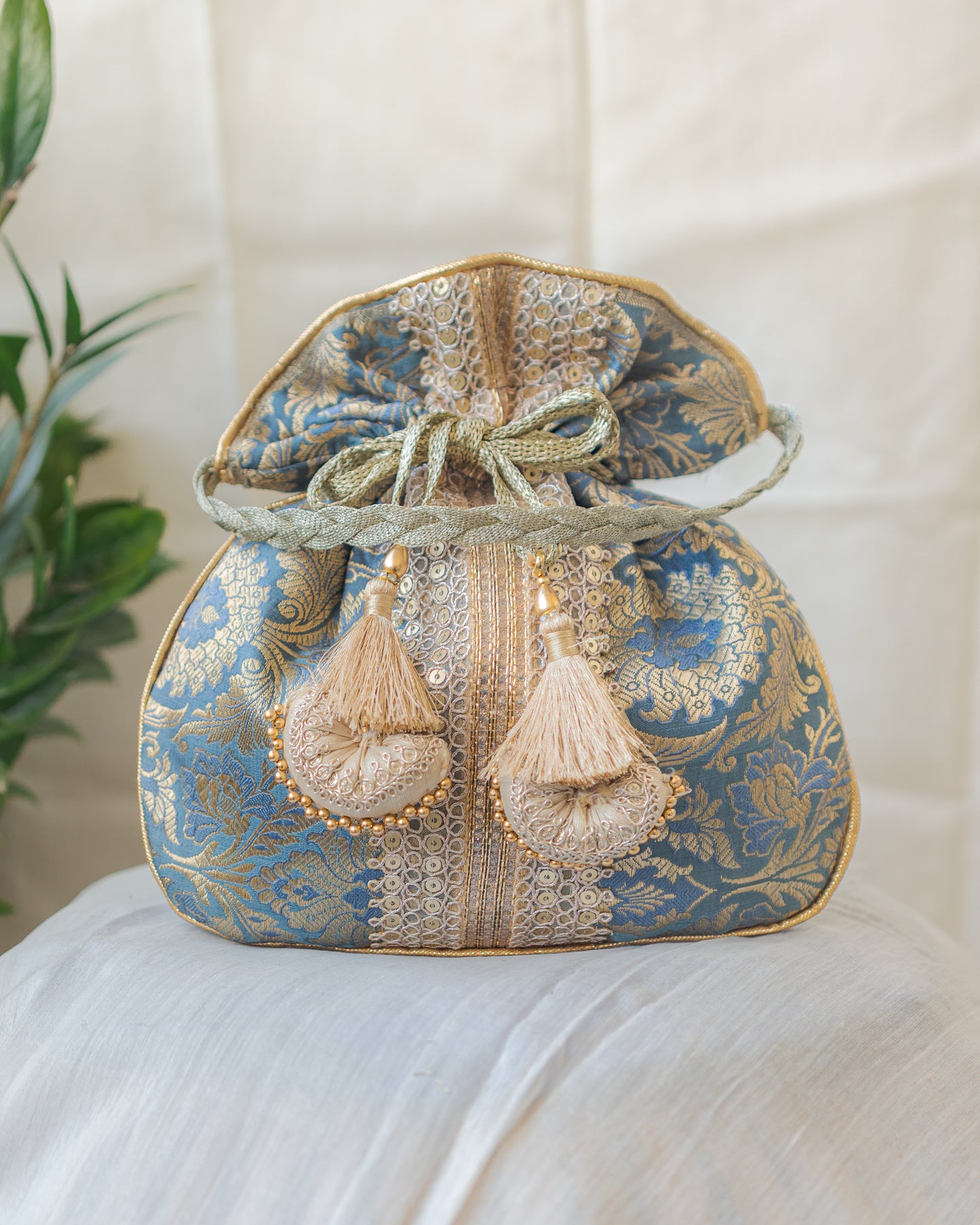 Grey & Golden Banarasi Potli With Broad Lace
