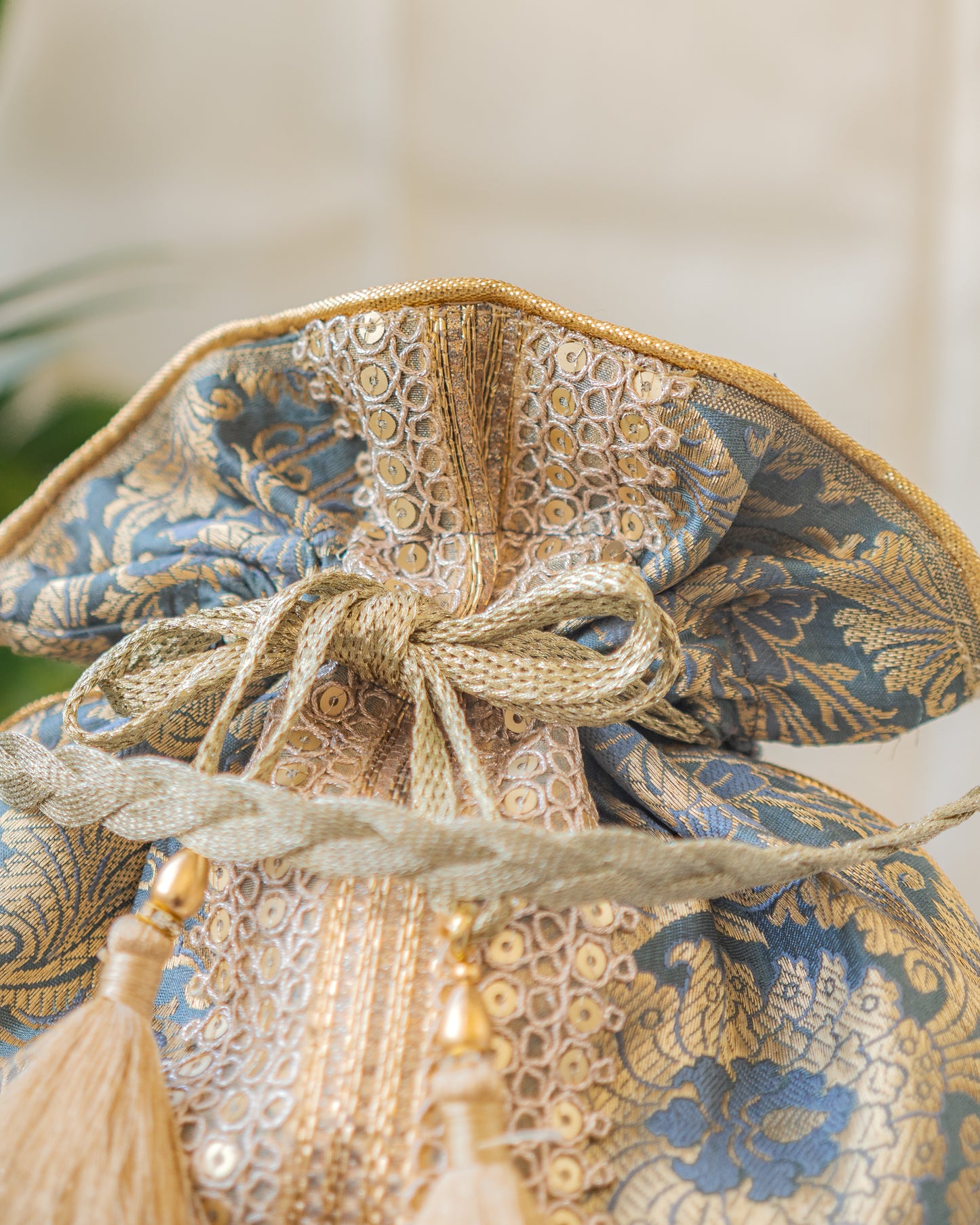 Grey & Golden Banarasi Potli With Broad Lace
