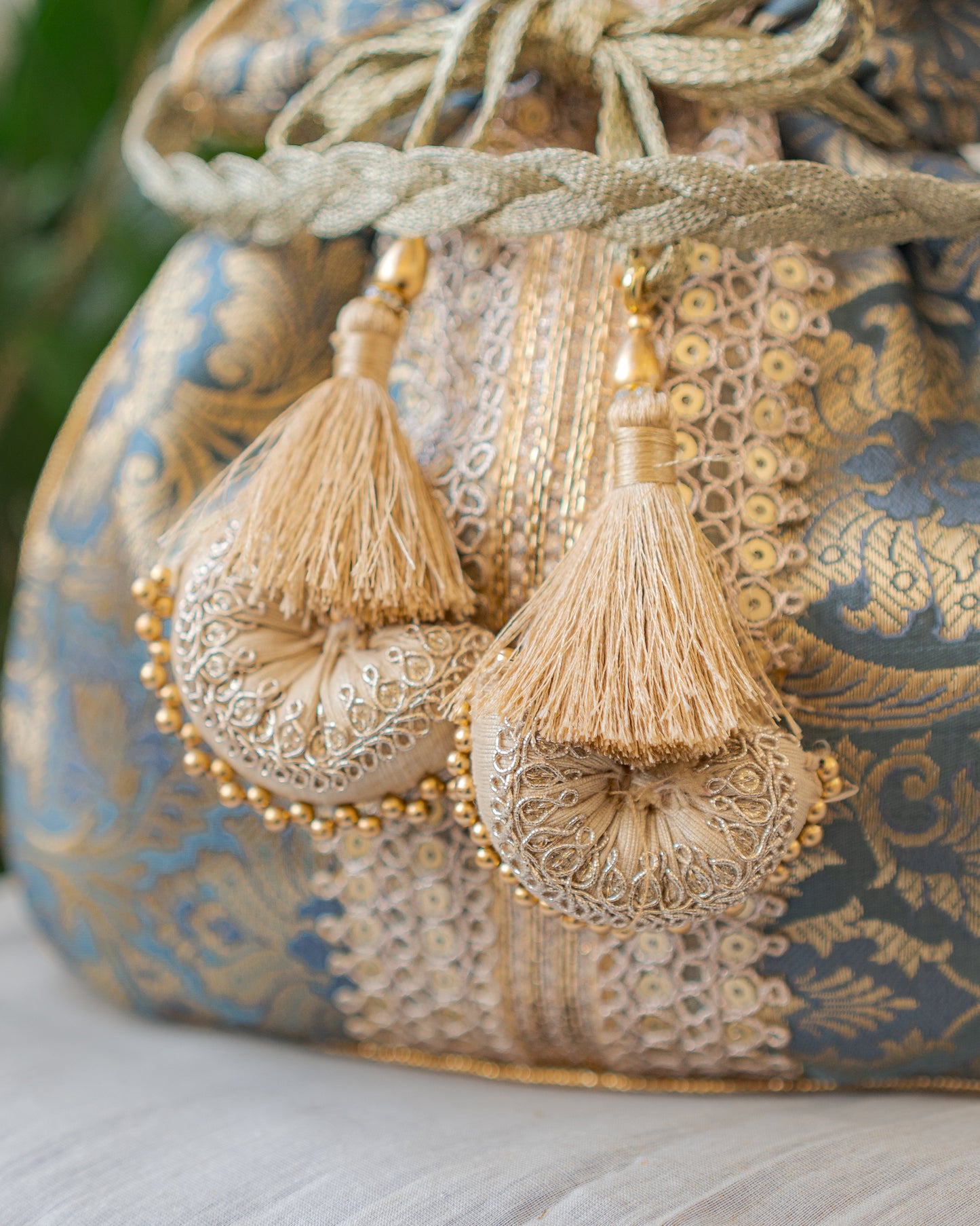Grey & Golden Banarasi Potli With Broad Lace