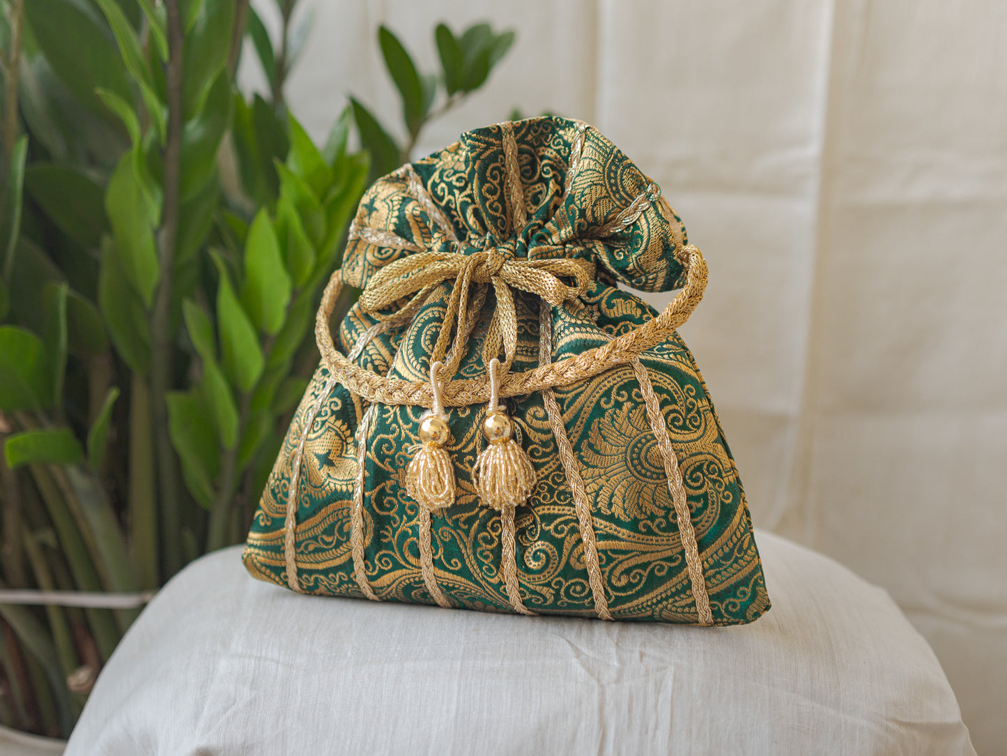 Bottle Green & Golden Banarasi Potli With Glass Tassels