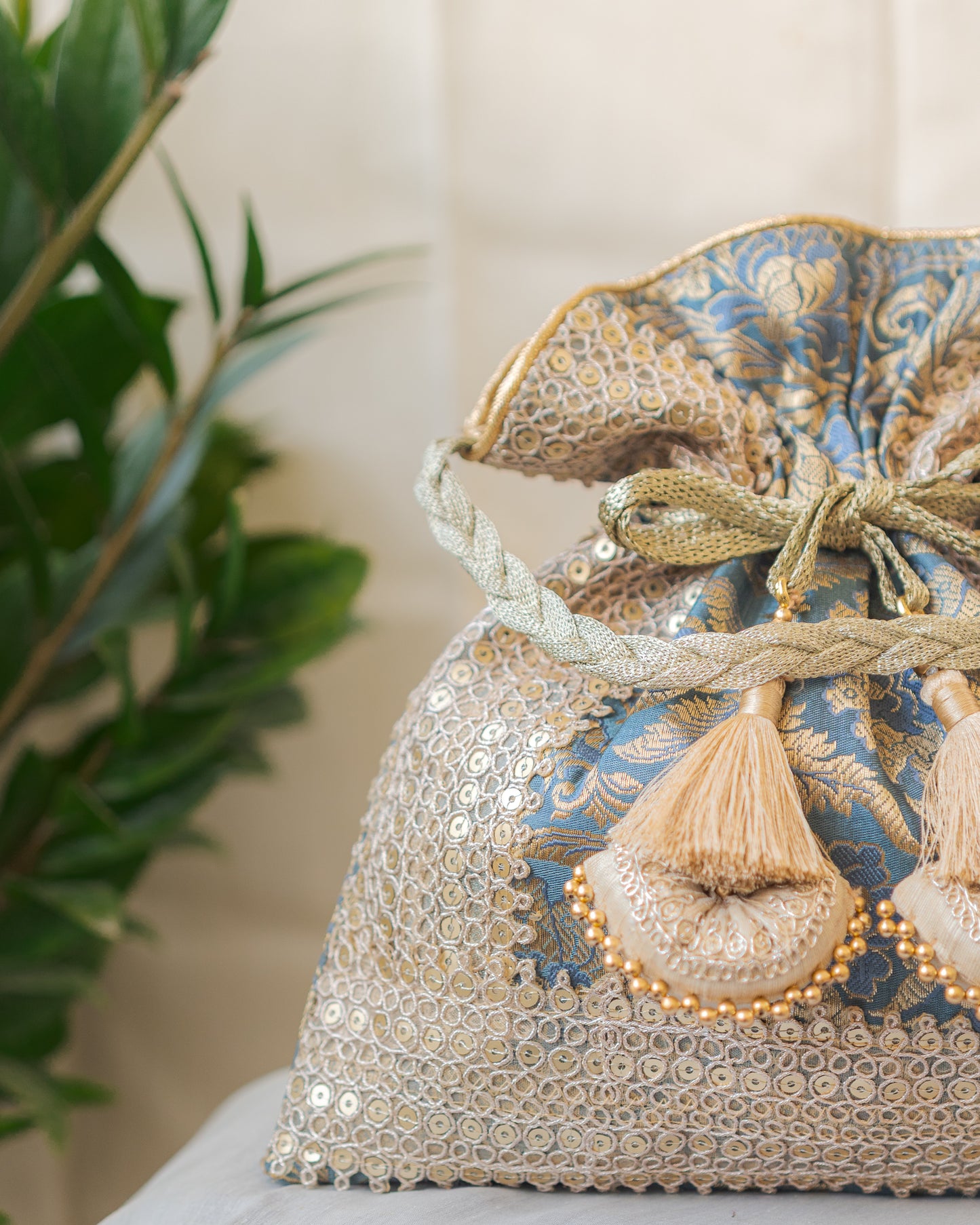 Grey & Golden Banarasi Potli With Triple Lace