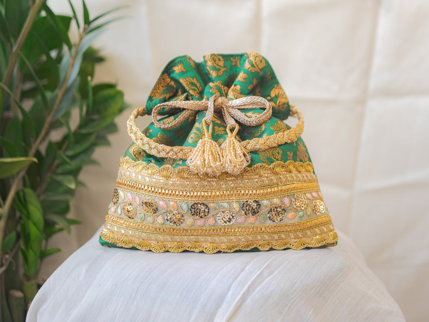 Green & Golden Banarasi Potli With Broad Lace