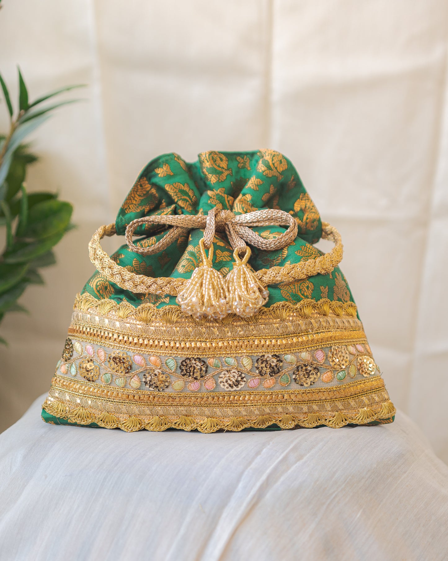 Green & Golden Banarasi Potli With Broad Lace