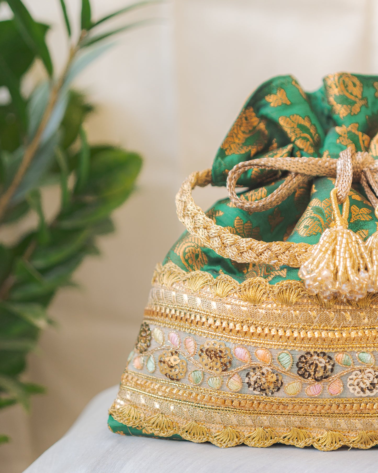 Green & Golden Banarasi Potli With Broad Lace