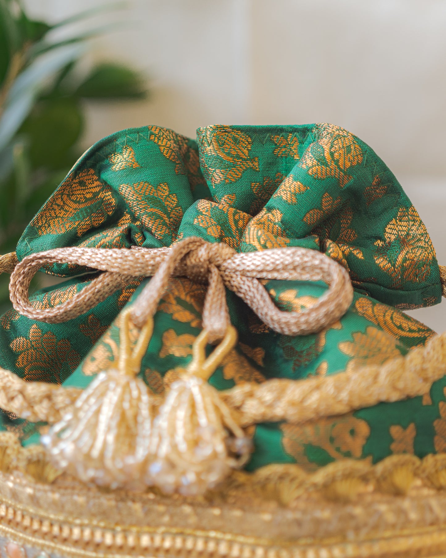 Green & Golden Banarasi Potli With Broad Lace
