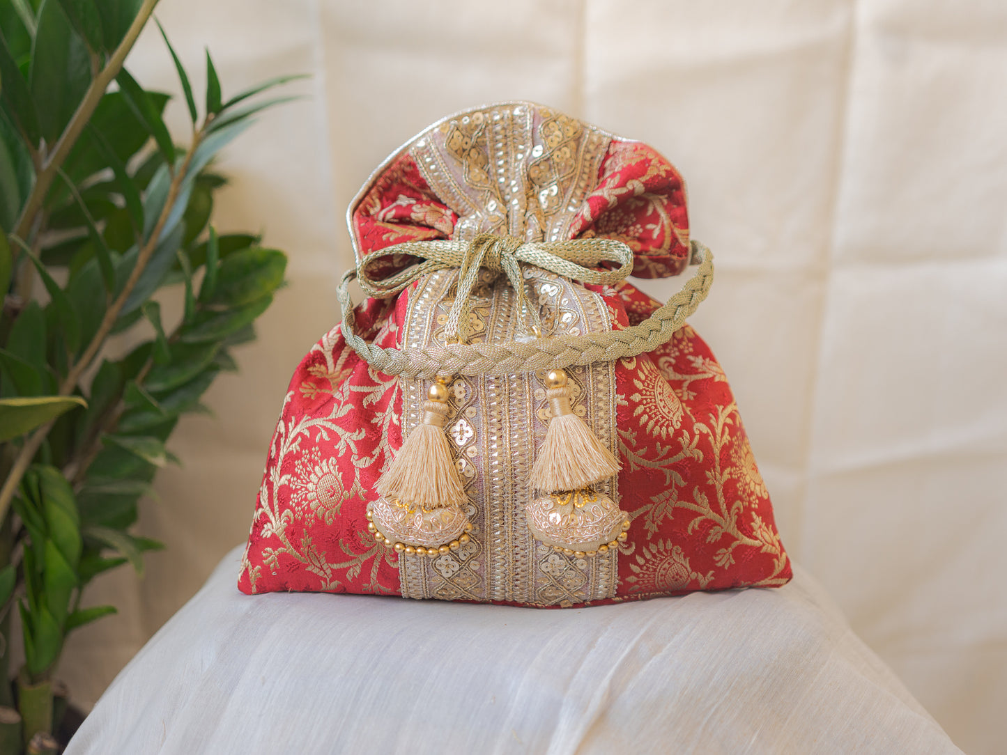 Maroon & Golden Banarasi Potli Bag With Broad Lace