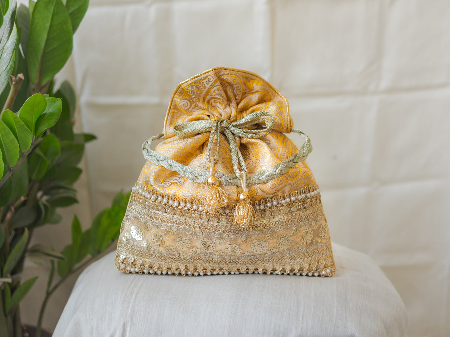 Light Yellow & Golden Banarasi Potli With Broad Sequin Pearl Lacework