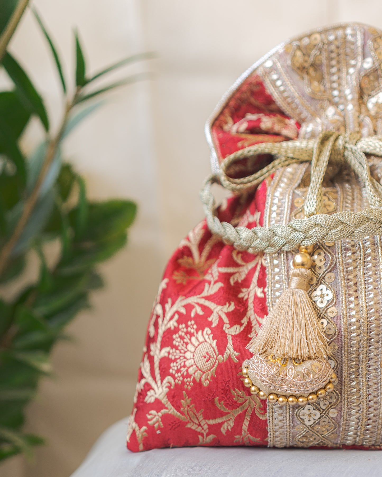 Maroon & Golden Banarasi Potli Bag With Broad Lace
