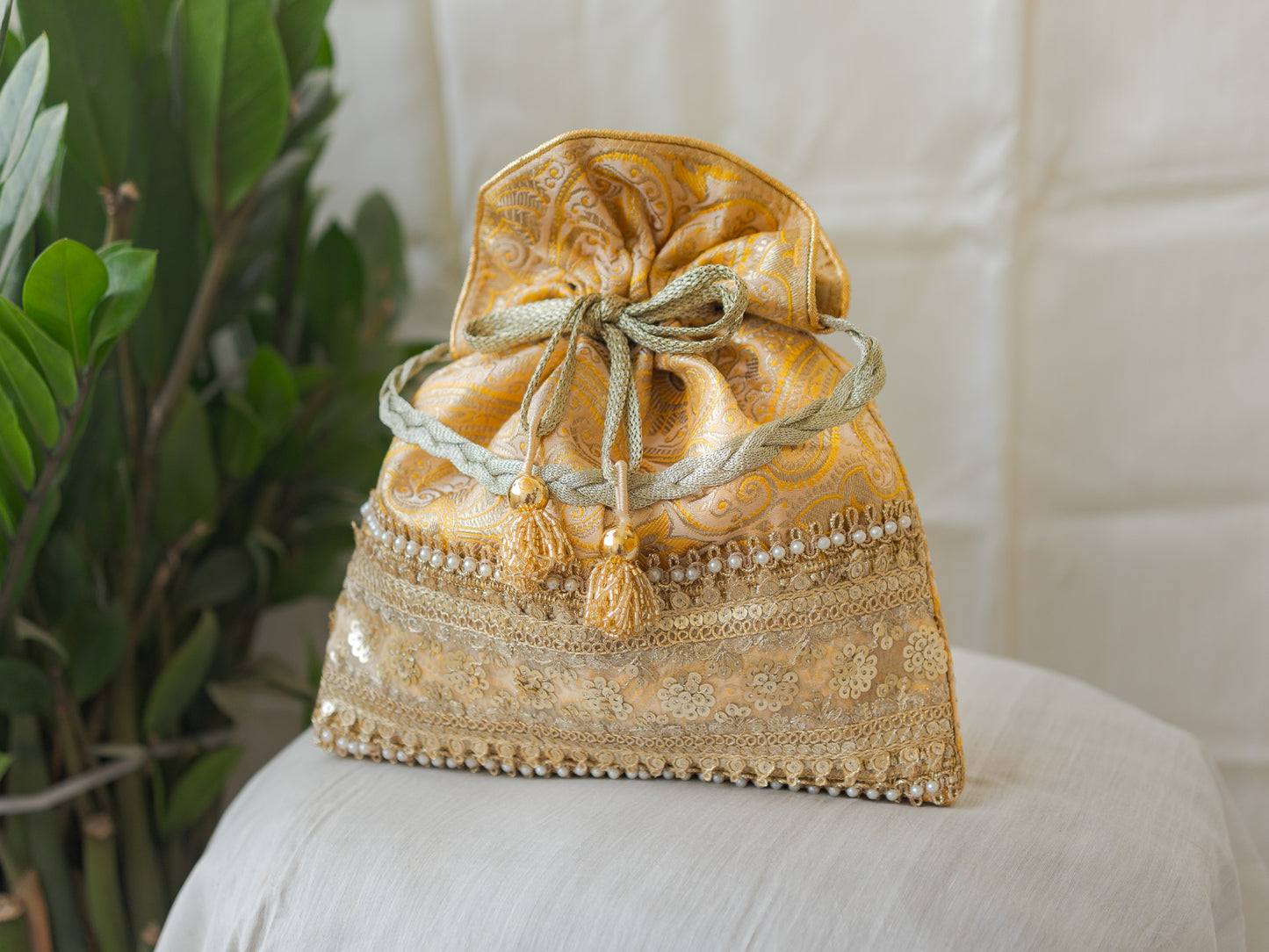 Light Yellow & Golden Banarasi Potli With Broad Sequin Pearl Lacework