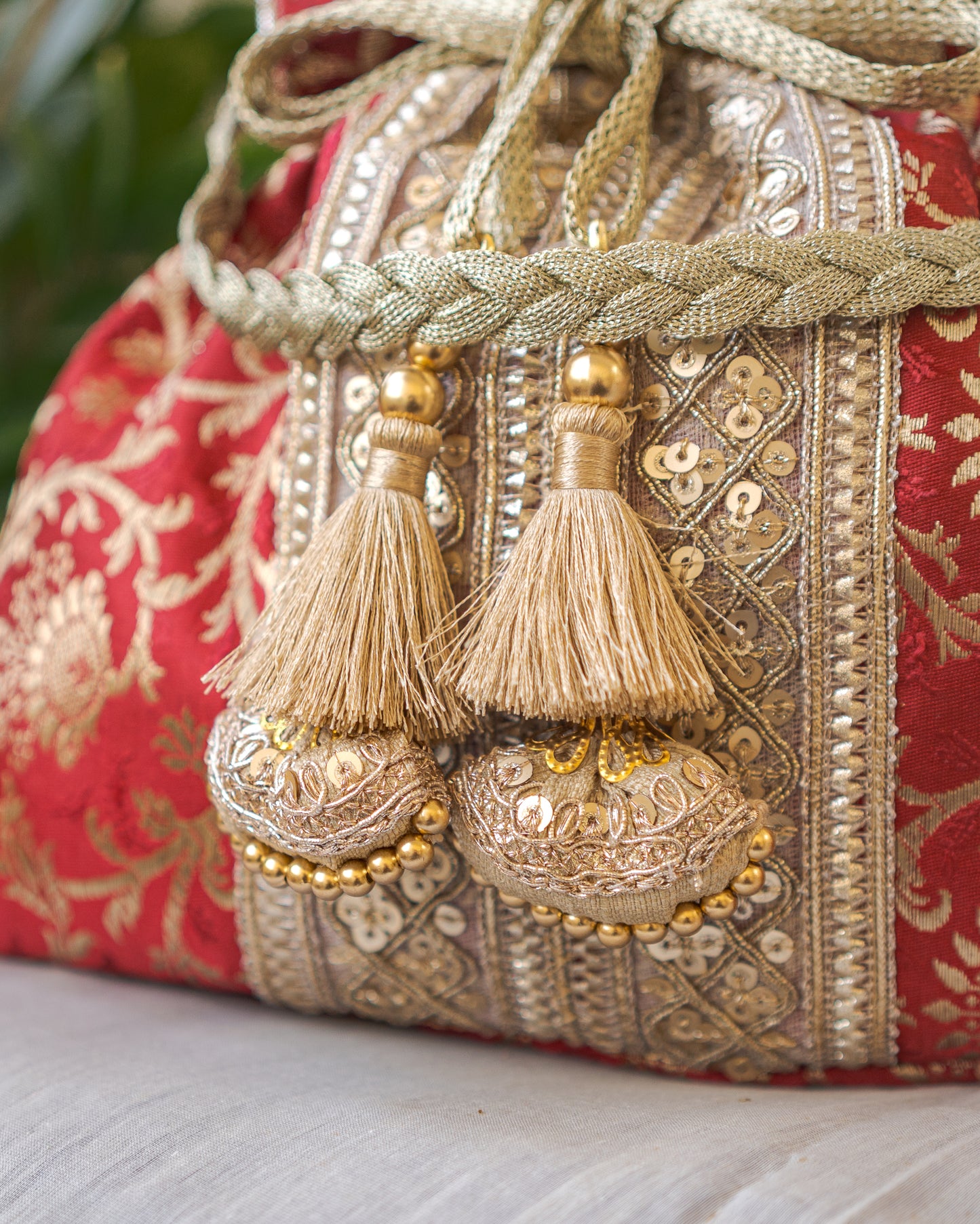 Maroon & Golden Banarasi Potli Bag With Broad Lace