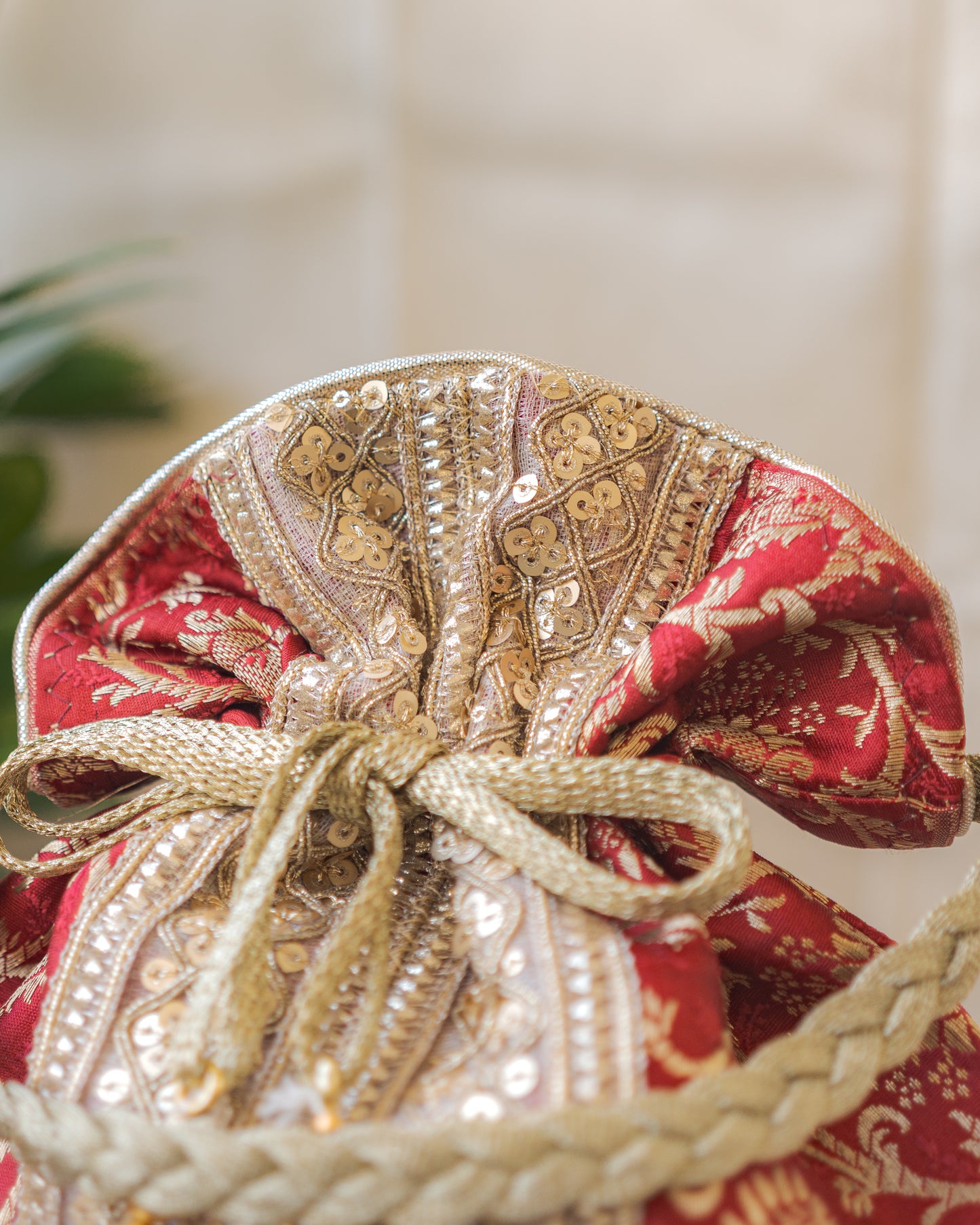Maroon & Golden Banarasi Potli Bag With Broad Lace