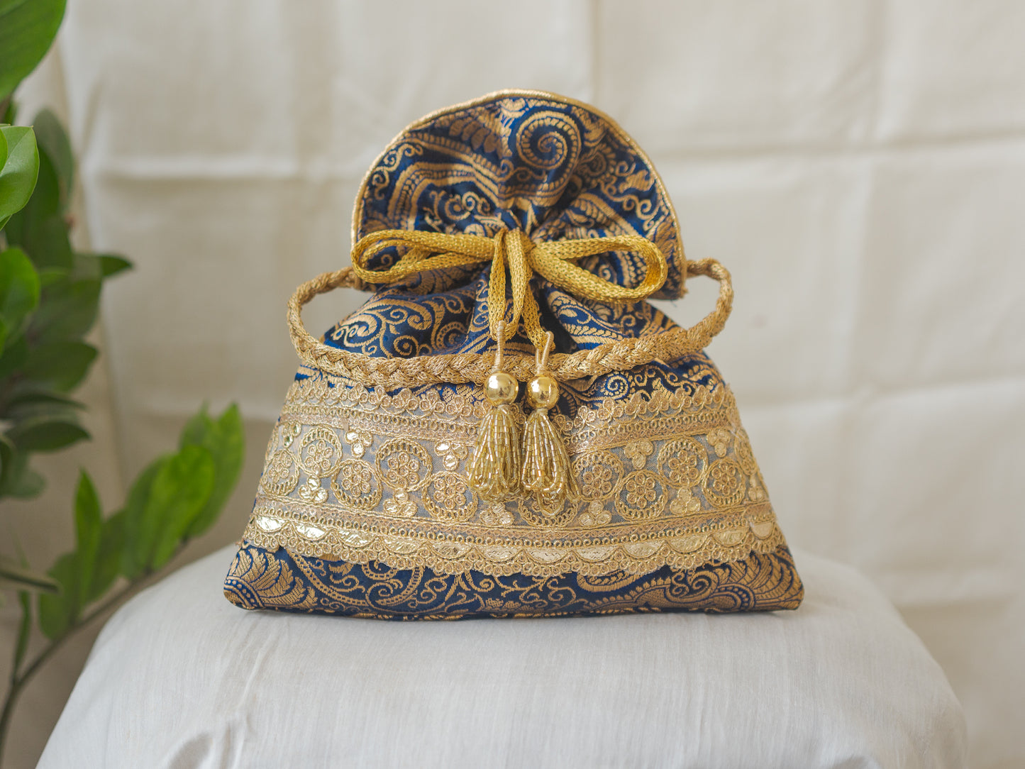 Navy Blue & Golden Banarasi Potli With Golden Broad Lace