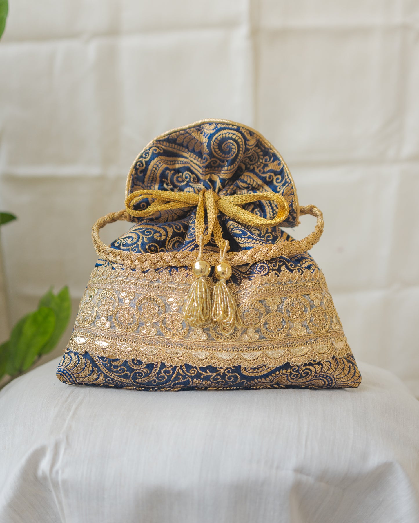 Navy Blue & Golden Banarasi Potli With Golden Broad Lace