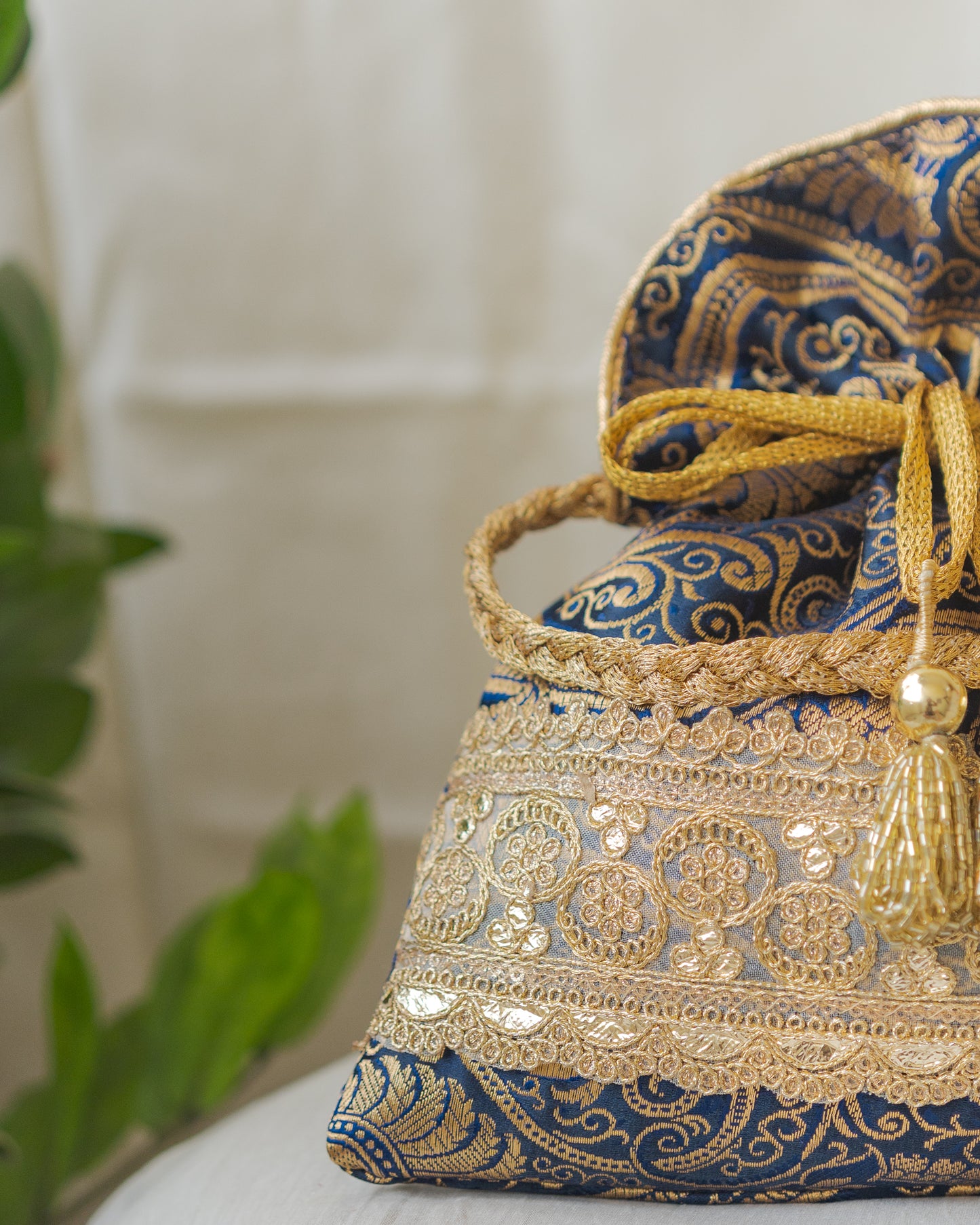 Navy Blue & Golden Banarasi Potli With Golden Broad Lace