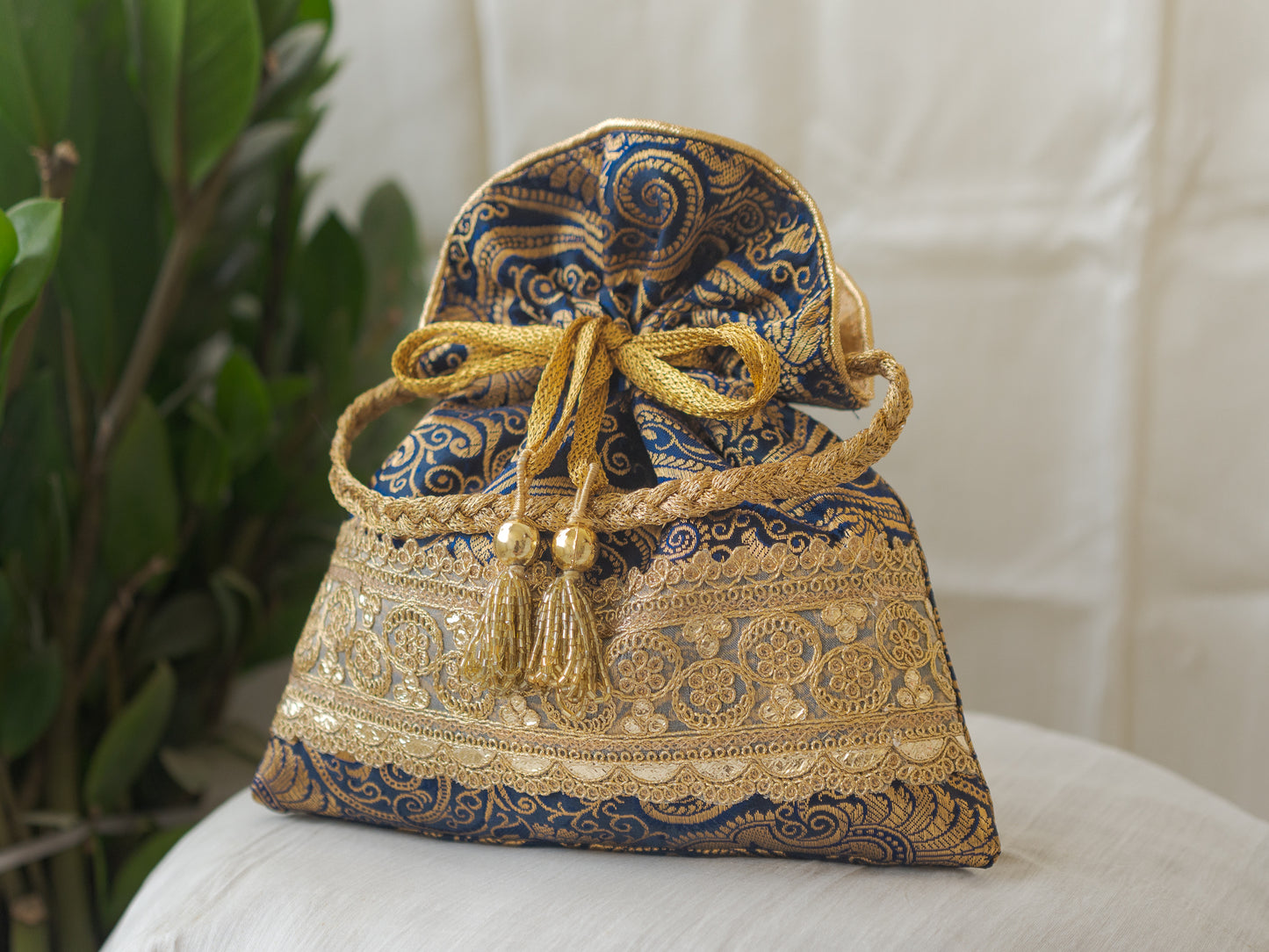 Navy Blue & Golden Banarasi Potli With Golden Broad Lace