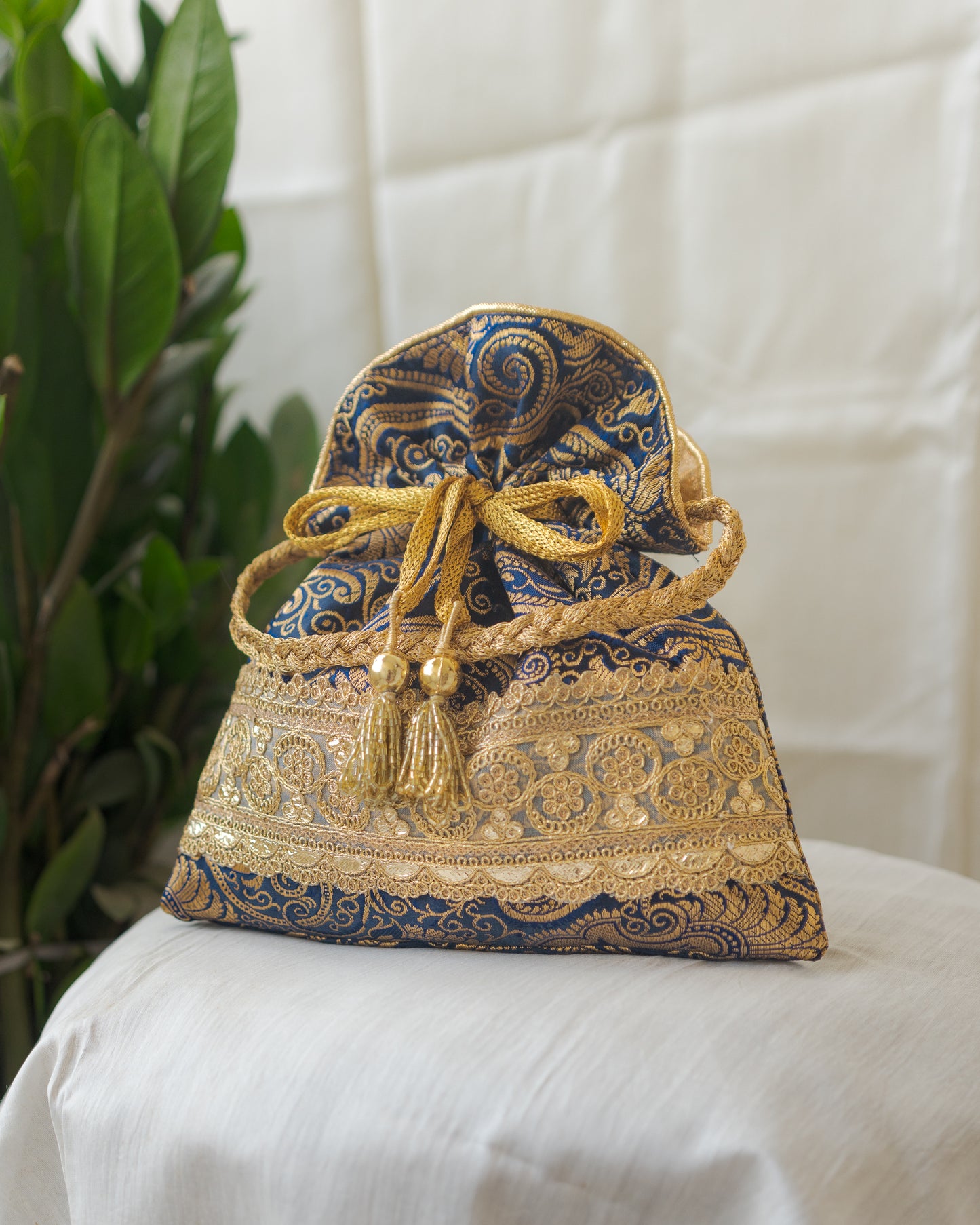 Navy Blue & Golden Banarasi Potli With Golden Broad Lace