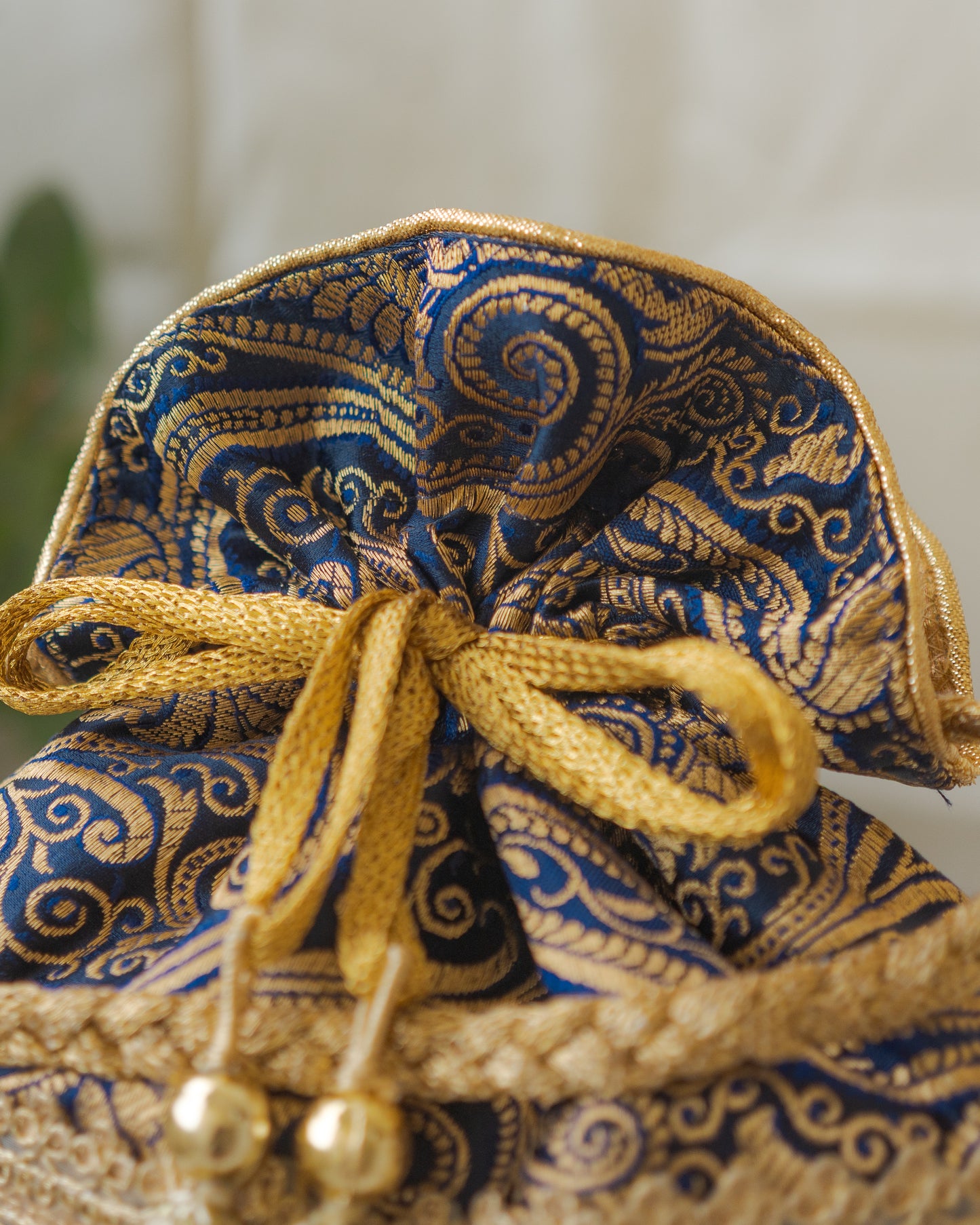 Navy Blue & Golden Banarasi Potli With Golden Broad Lace
