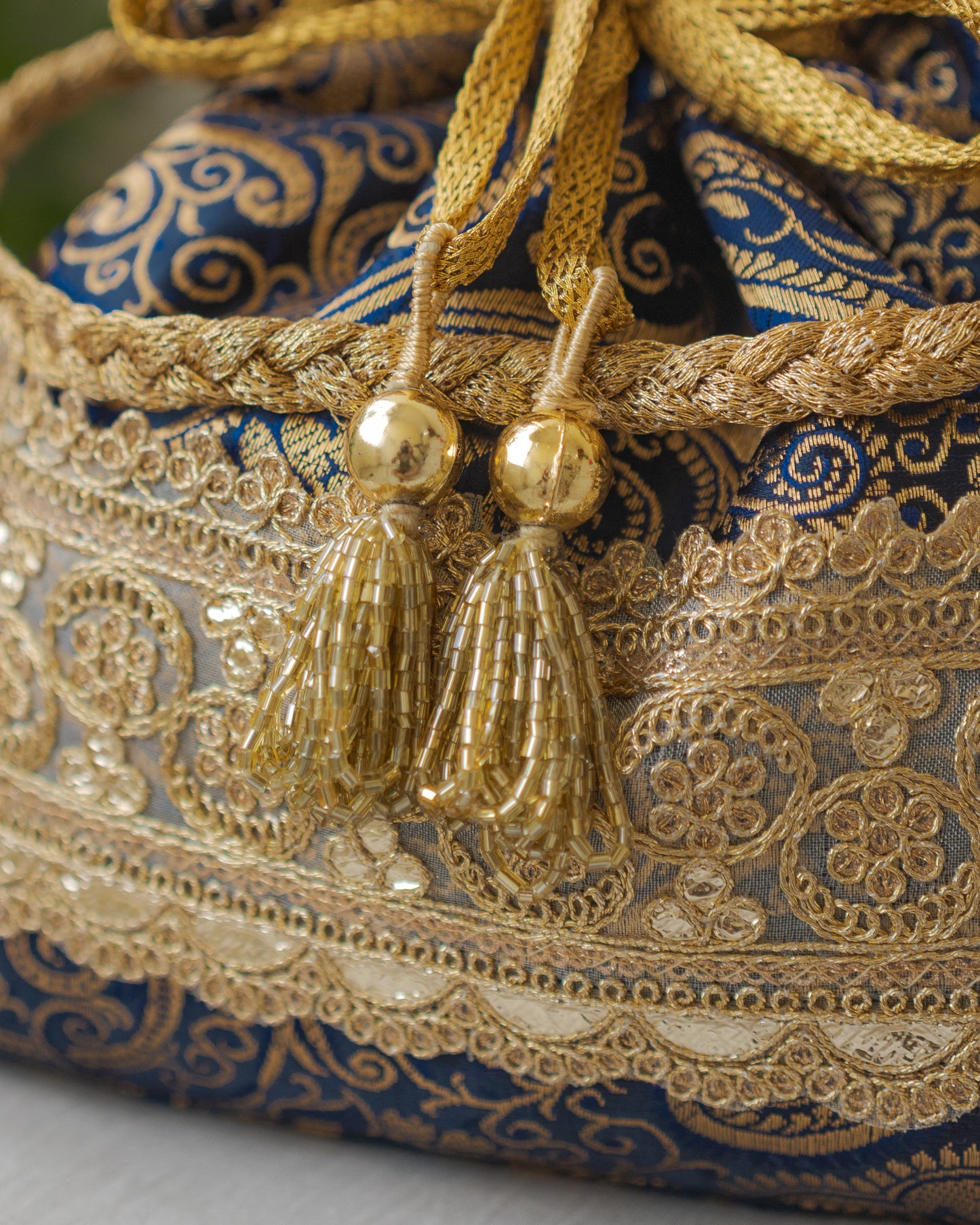 Navy Blue & Golden Banarasi Potli With Golden Broad Lace