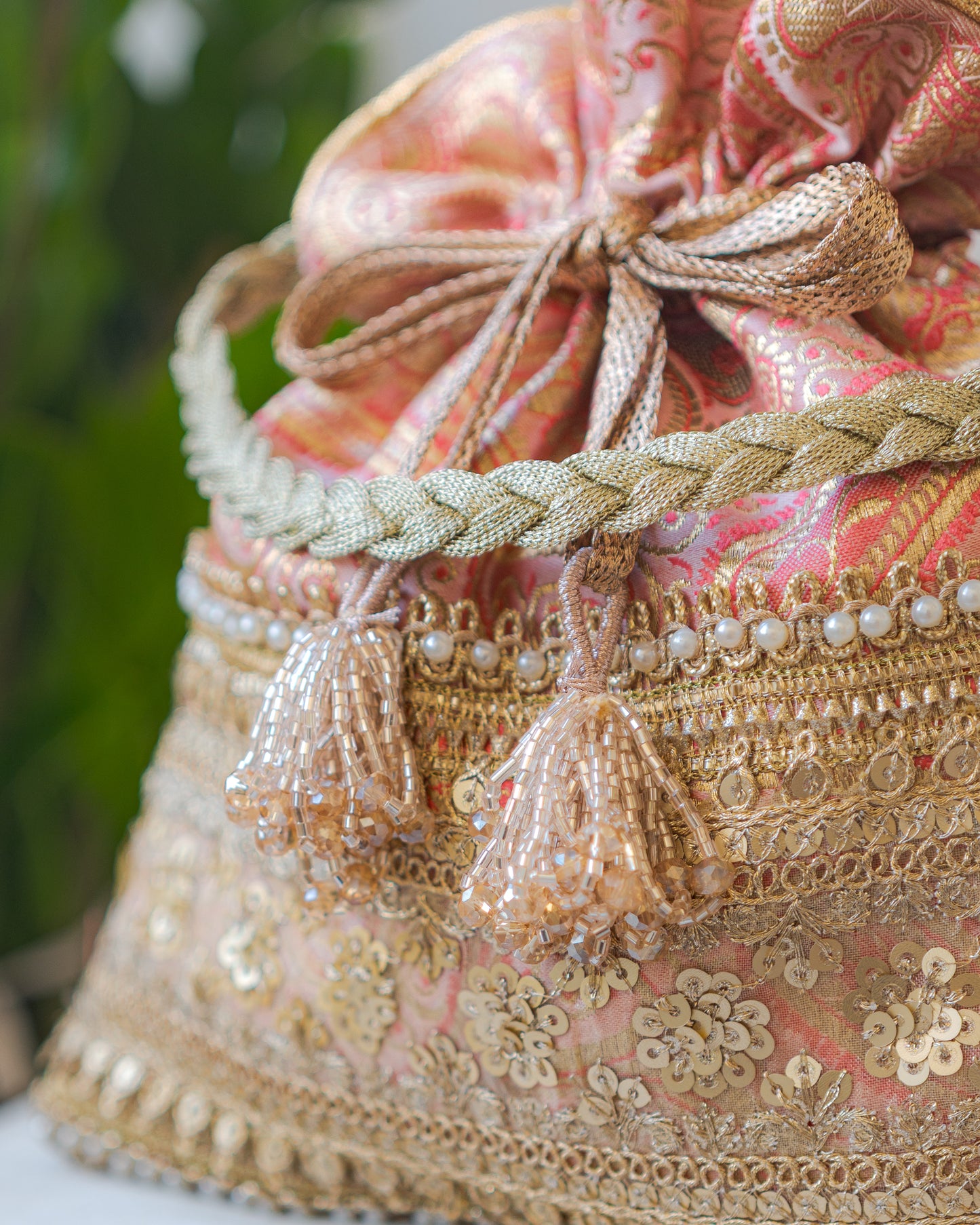 Peach Pink & Golden Banarasi Potli With Broad Sequin Pearl Lacework
