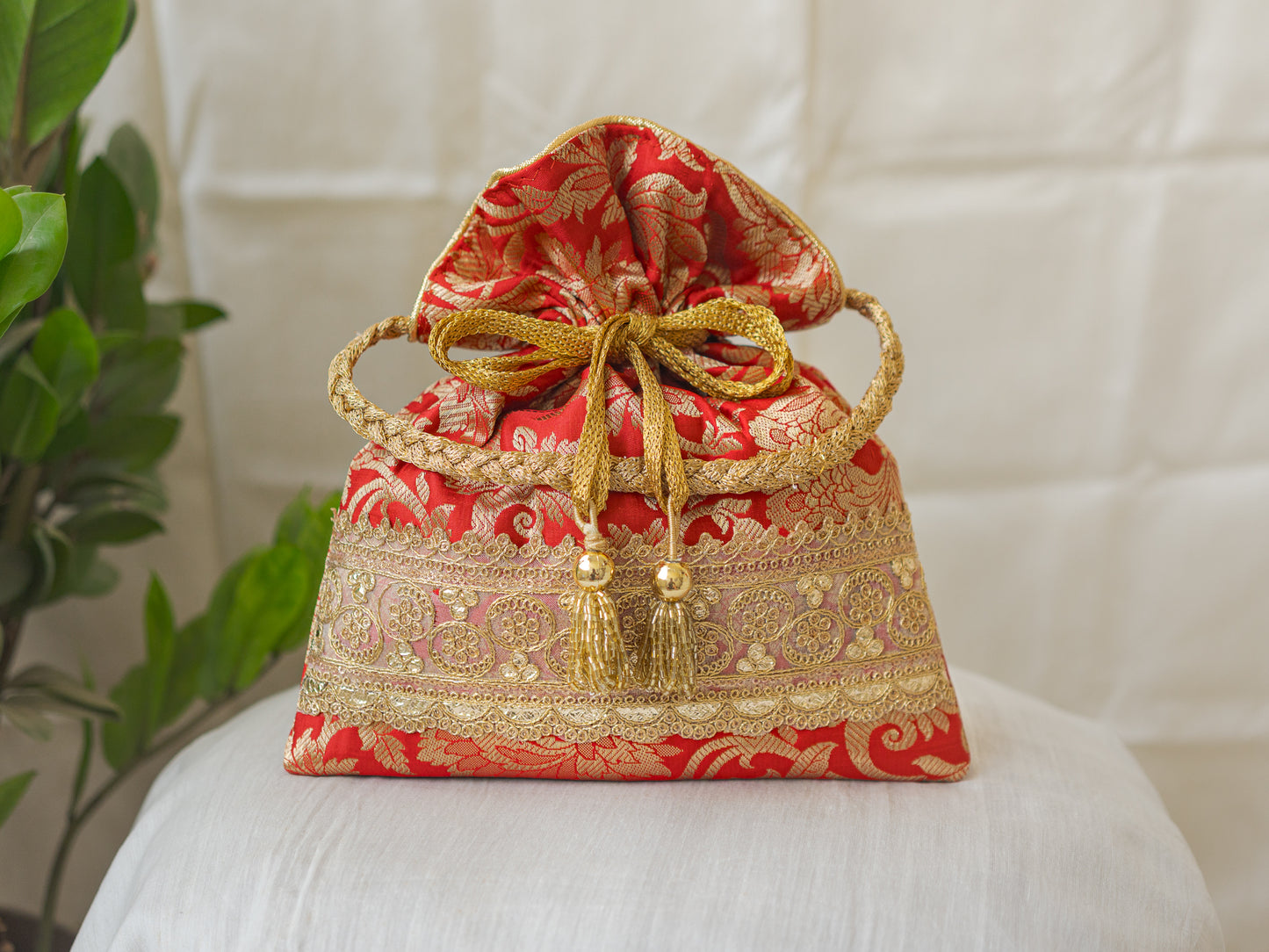 Red & Golden Banarasi Potli With Golden Broad Lace