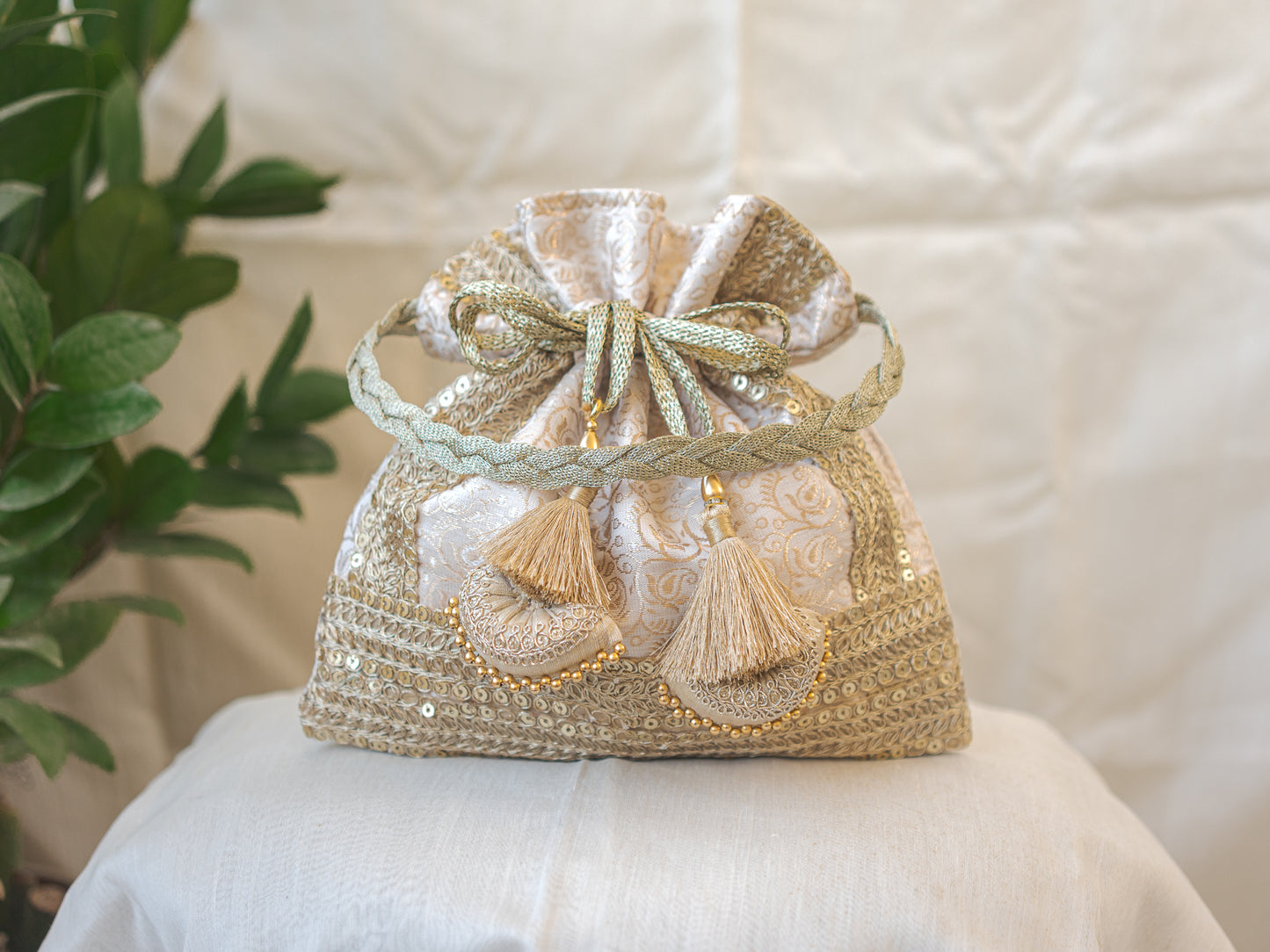 White & Golden Banarasi Potli With Triple Lace