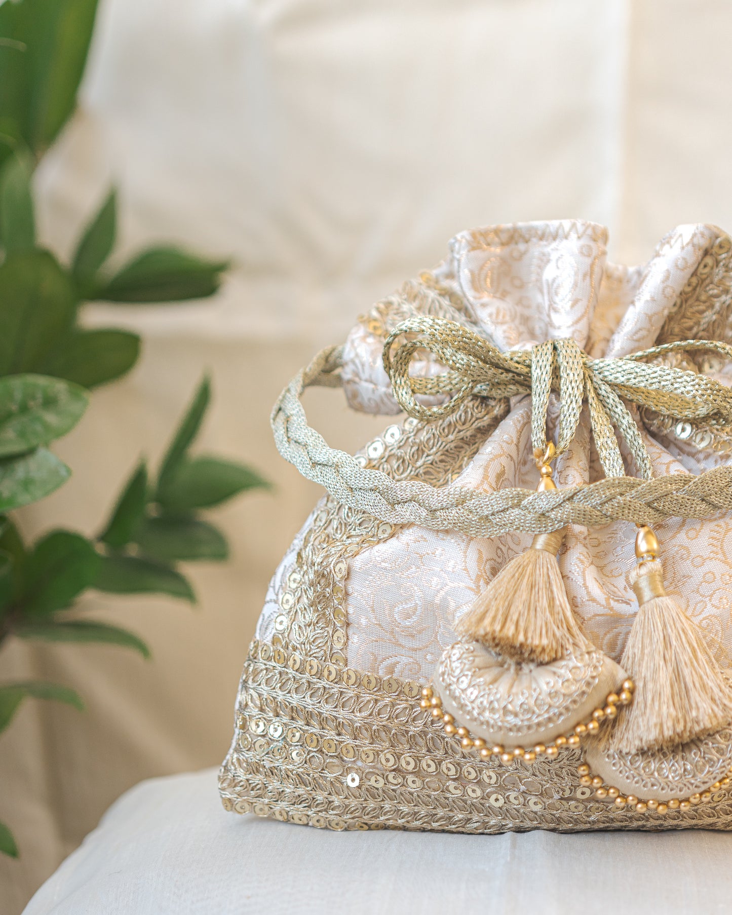White & Golden Banarasi Potli With Triple Lace