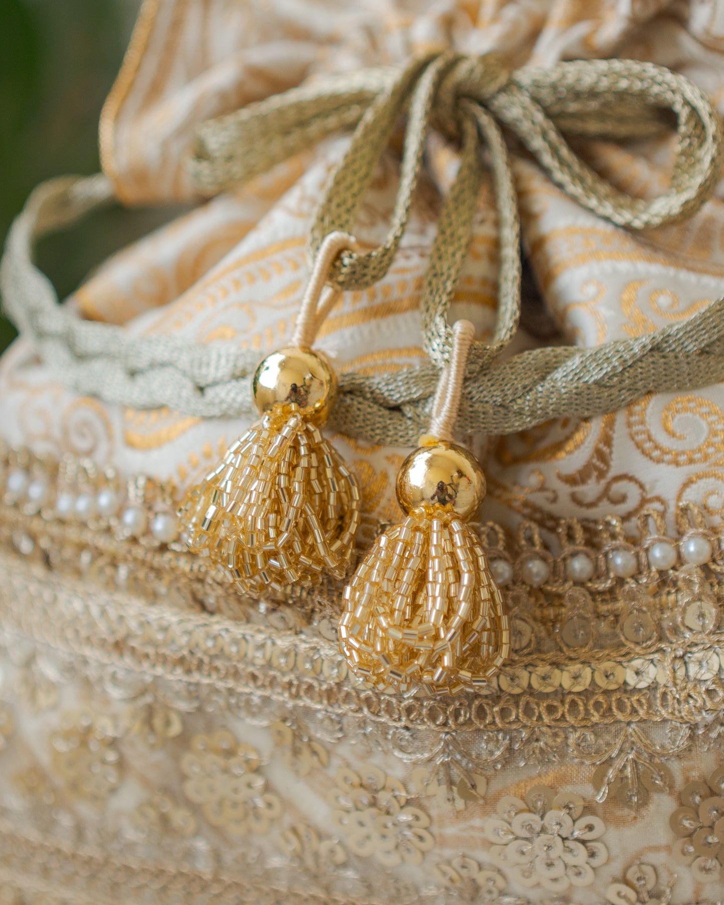 Royal White & Golden Banarasi Potli With Broad Sequin Pearl Lacework