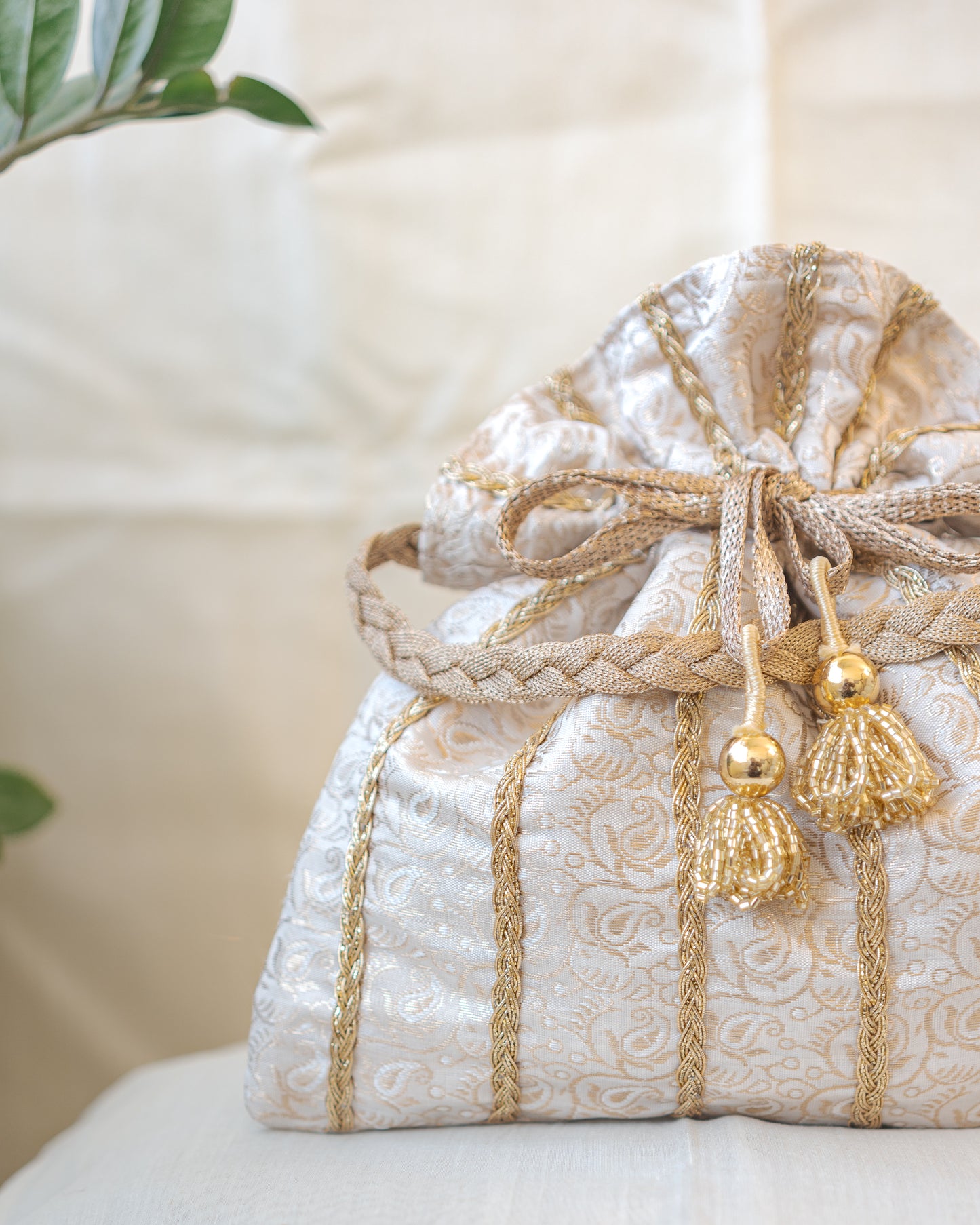 White & Golden Lace Potli With Glass Tassels