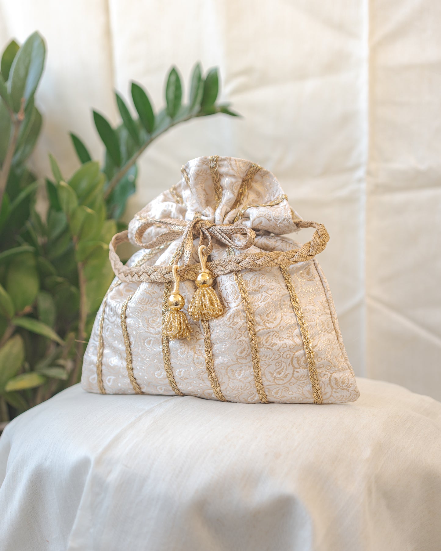 White & Golden Lace Potli With Glass Tassels