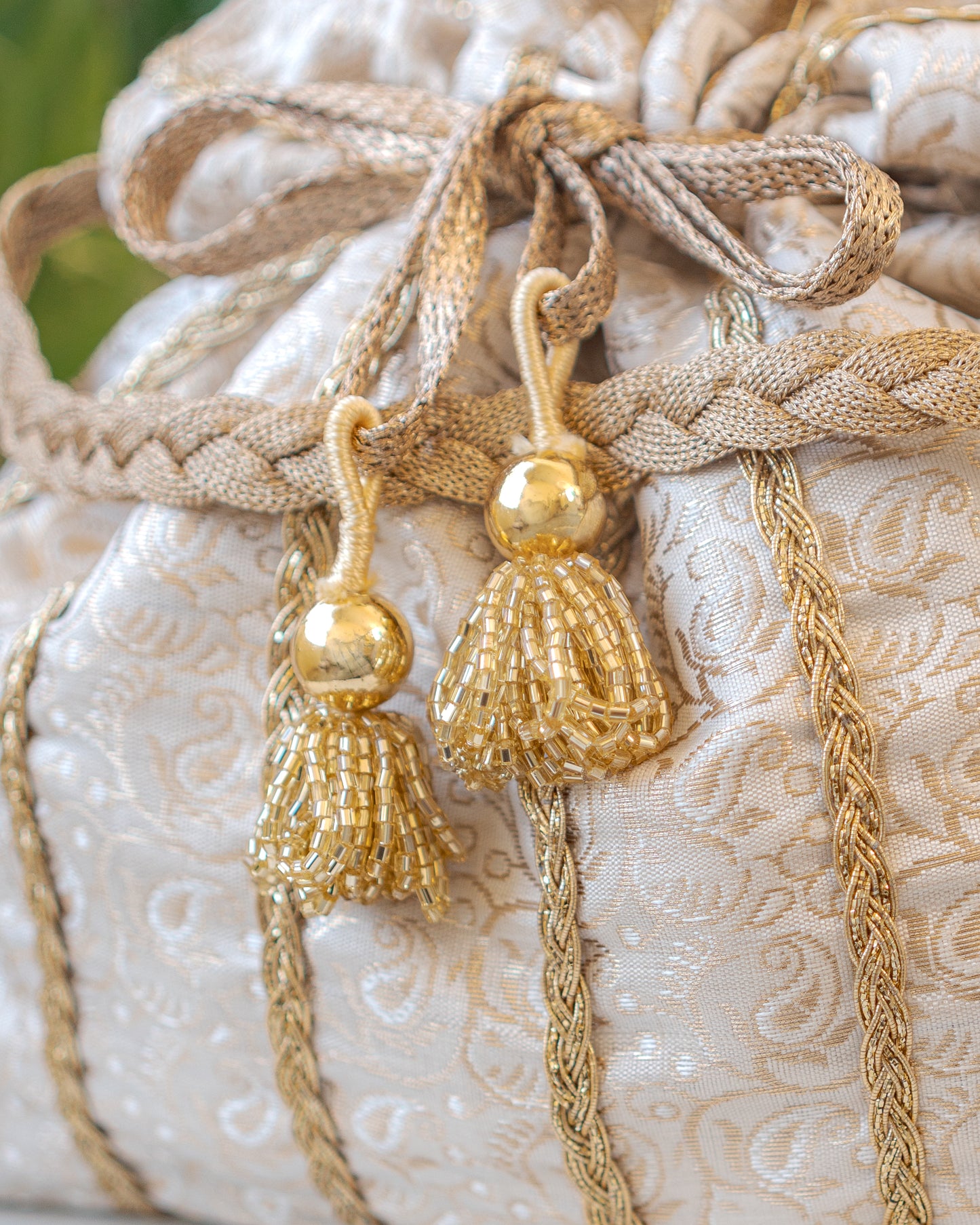 White & Golden Lace Potli With Glass Tassels