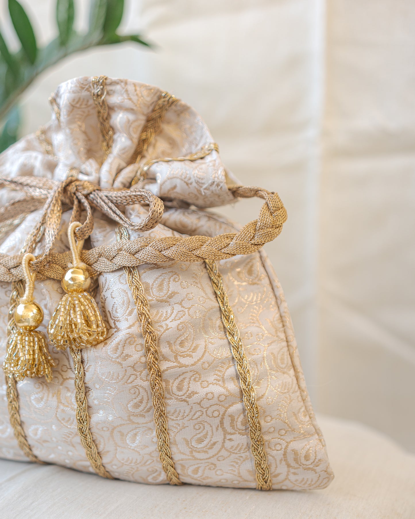 White & Golden Lace Potli With Glass Tassels