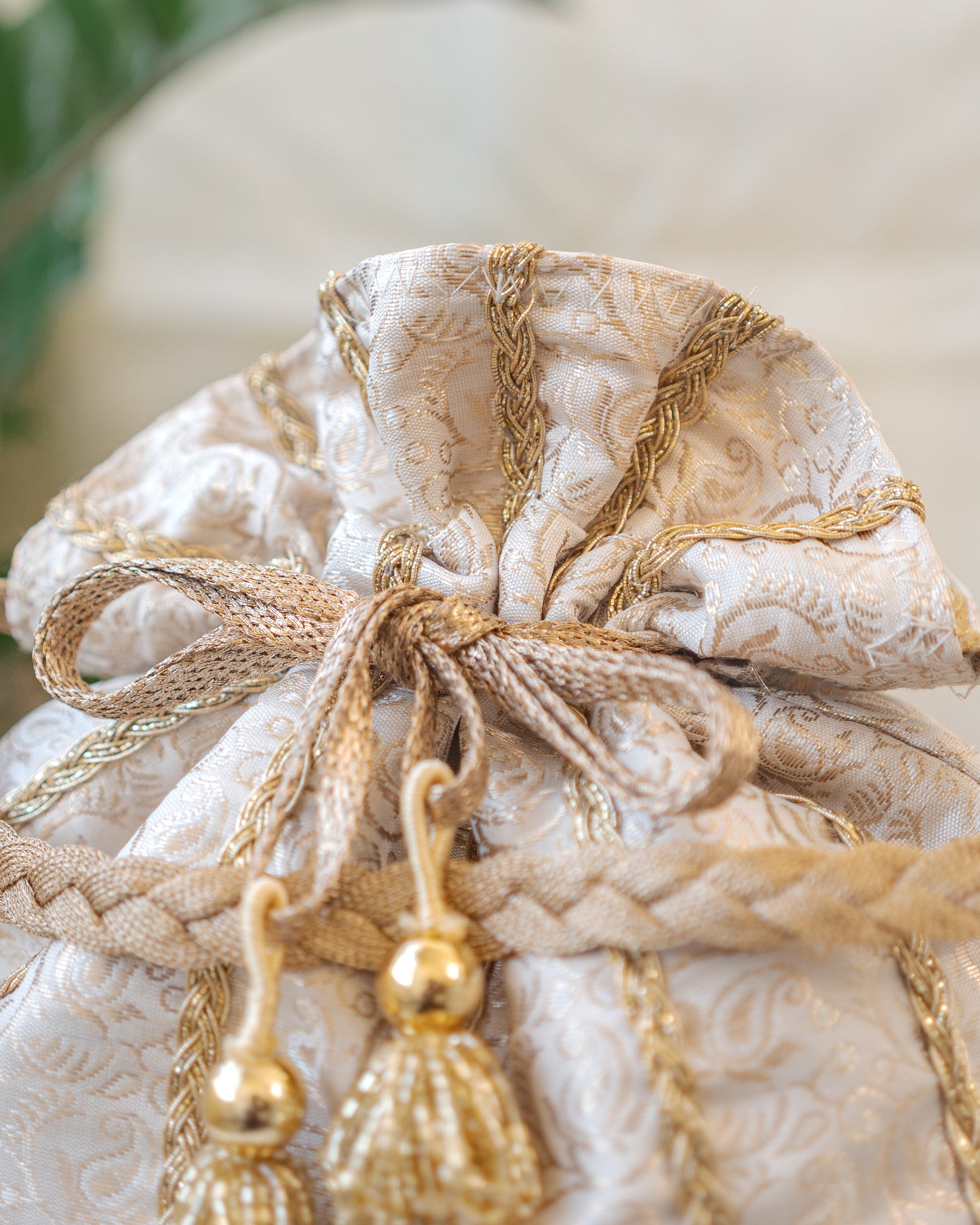 White & Golden Lace Potli With Glass Tassels