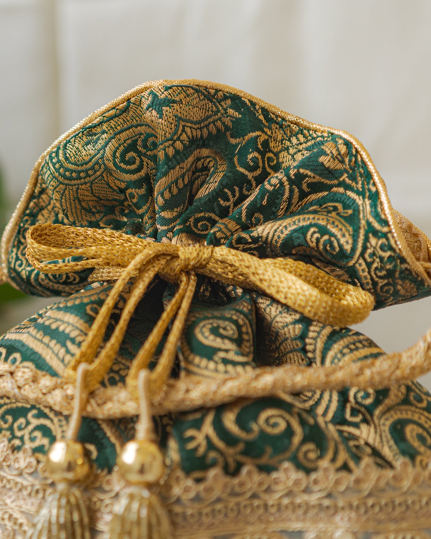 Bottle Green & Golden Banarasi Potli With Golden Broad Lace