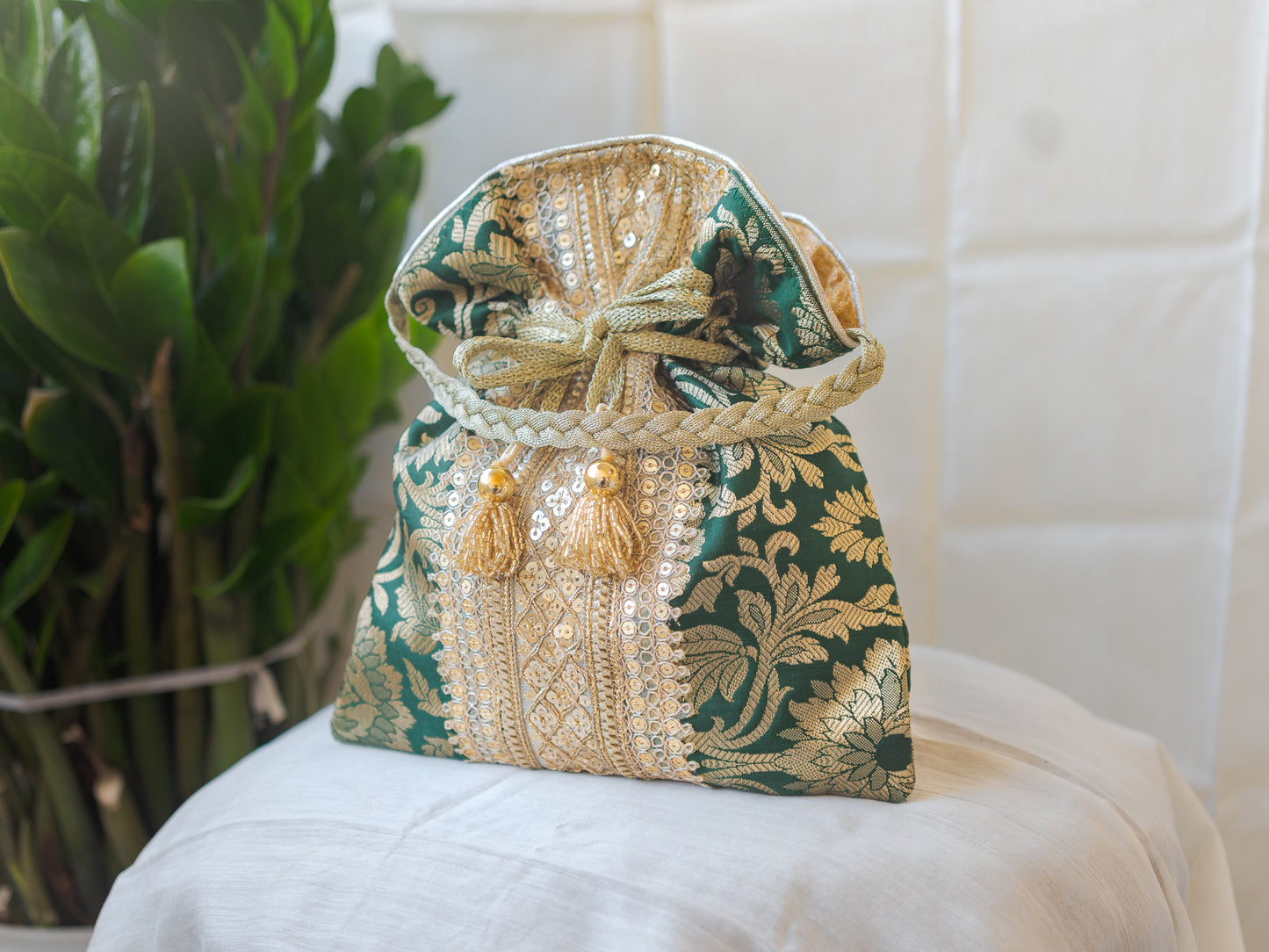 Bottle Green & Golden Banarasi Potli With Broad Lace