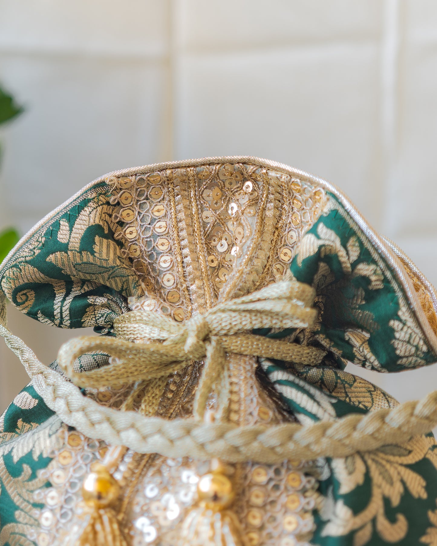 Bottle Green & Golden Banarasi Potli With Broad Lace