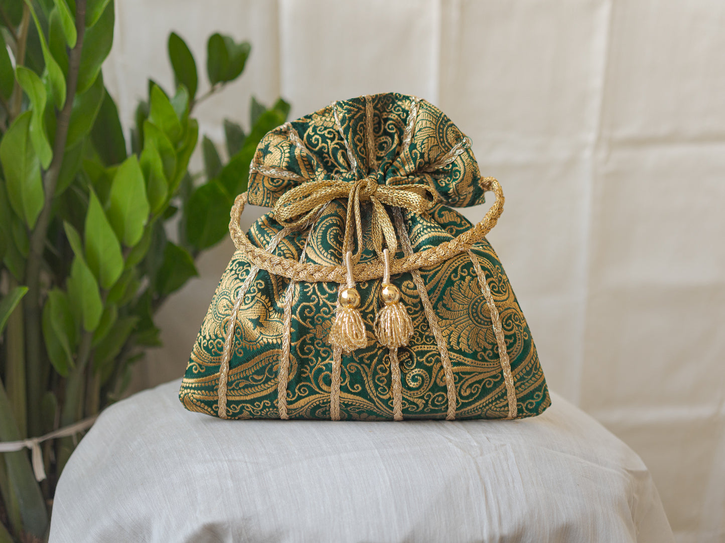 Bottle Green & Golden Banarasi Potli With Glass Tassels
