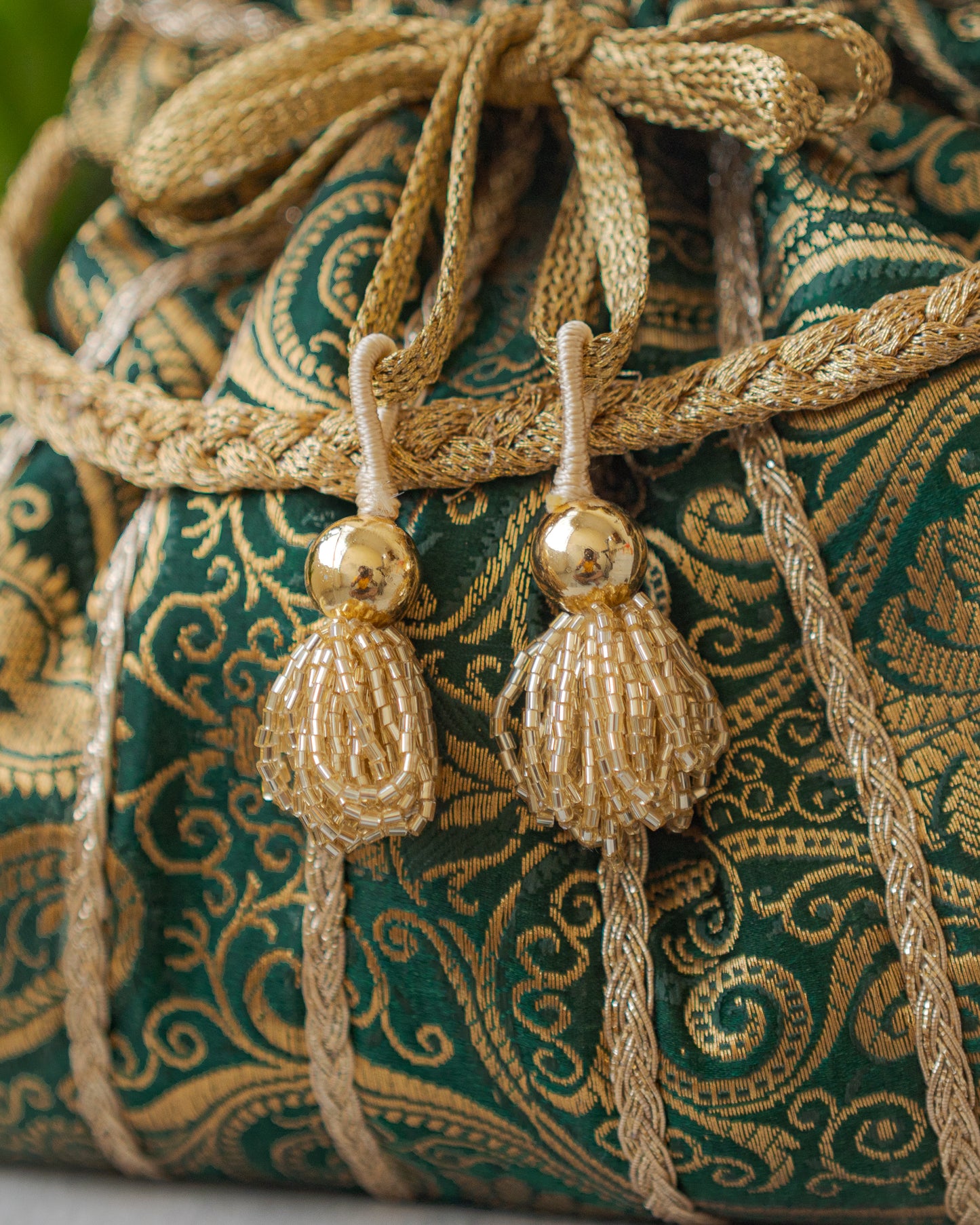 Bottle Green & Golden Banarasi Potli With Glass Tassels