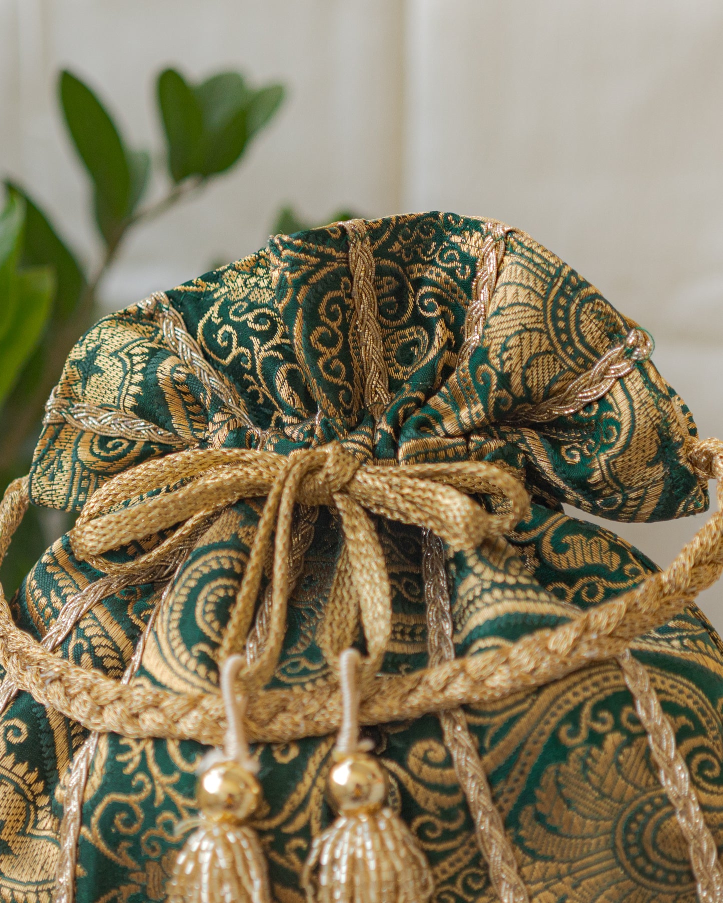 Bottle Green & Golden Banarasi Potli With Glass Tassels