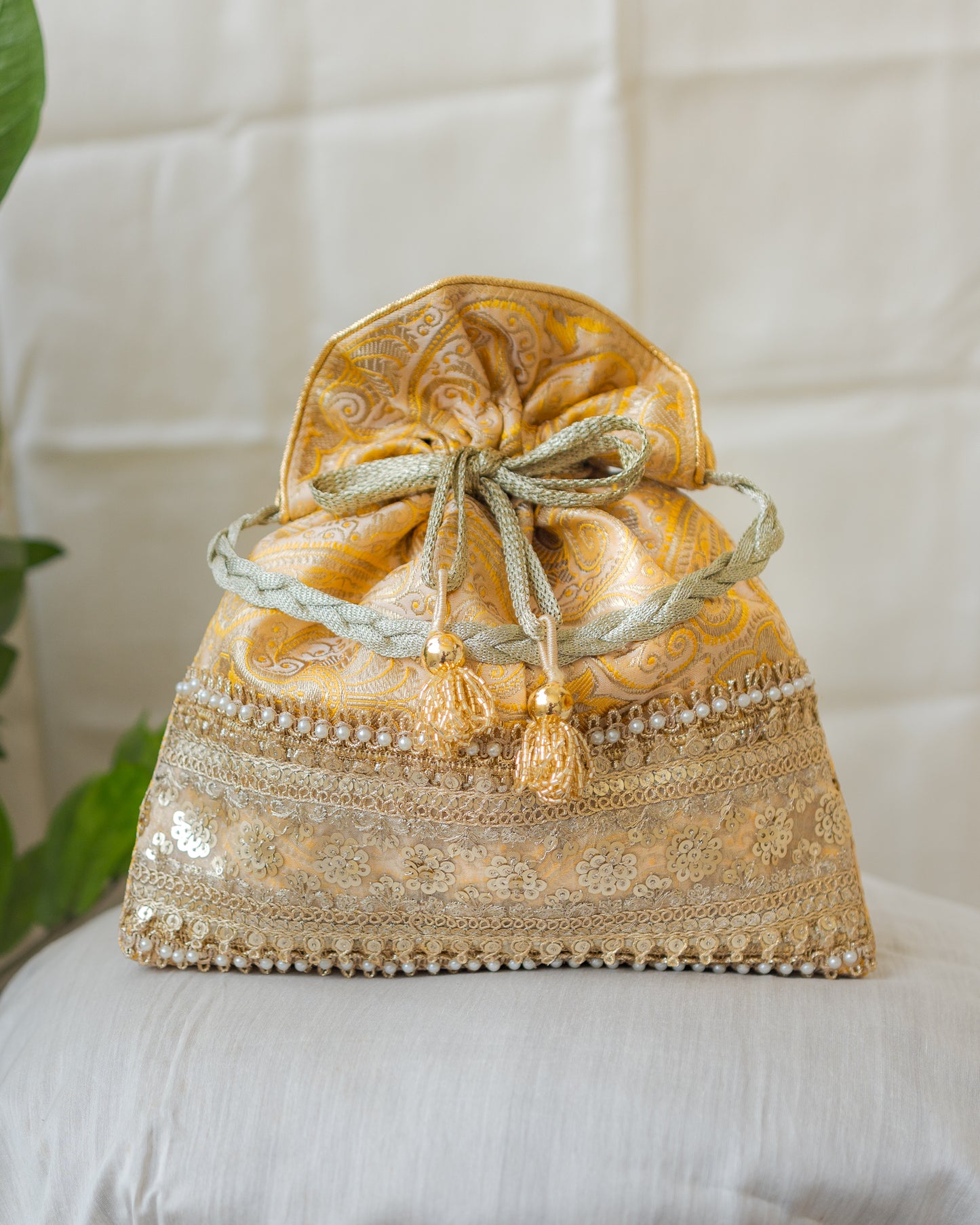 Light Yellow & Golden Banarasi Potli With Broad Sequin Pearl Lacework