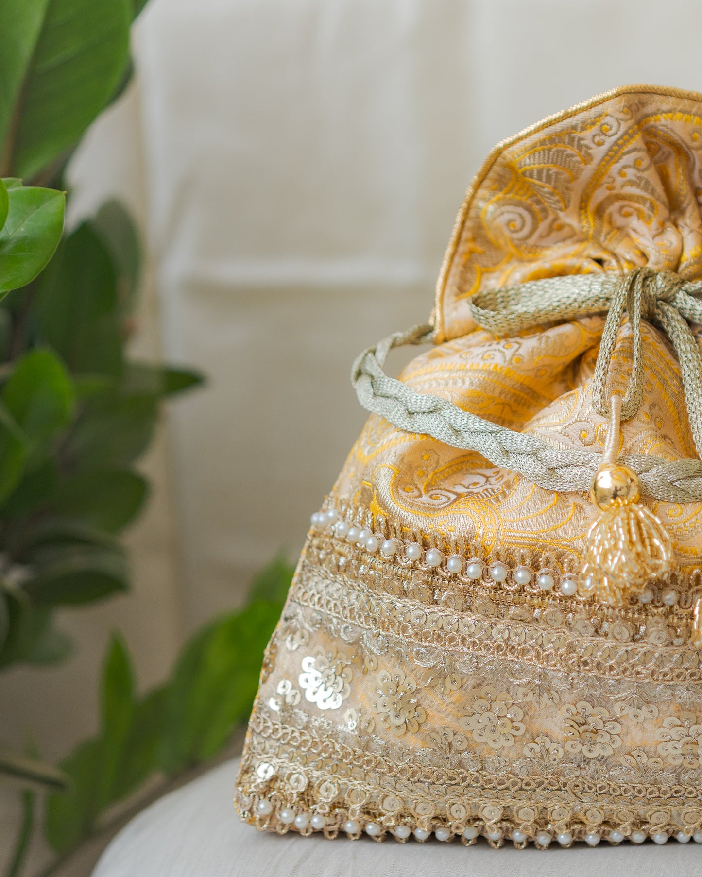 Light Yellow & Golden Banarasi Potli With Broad Sequin Pearl Lacework