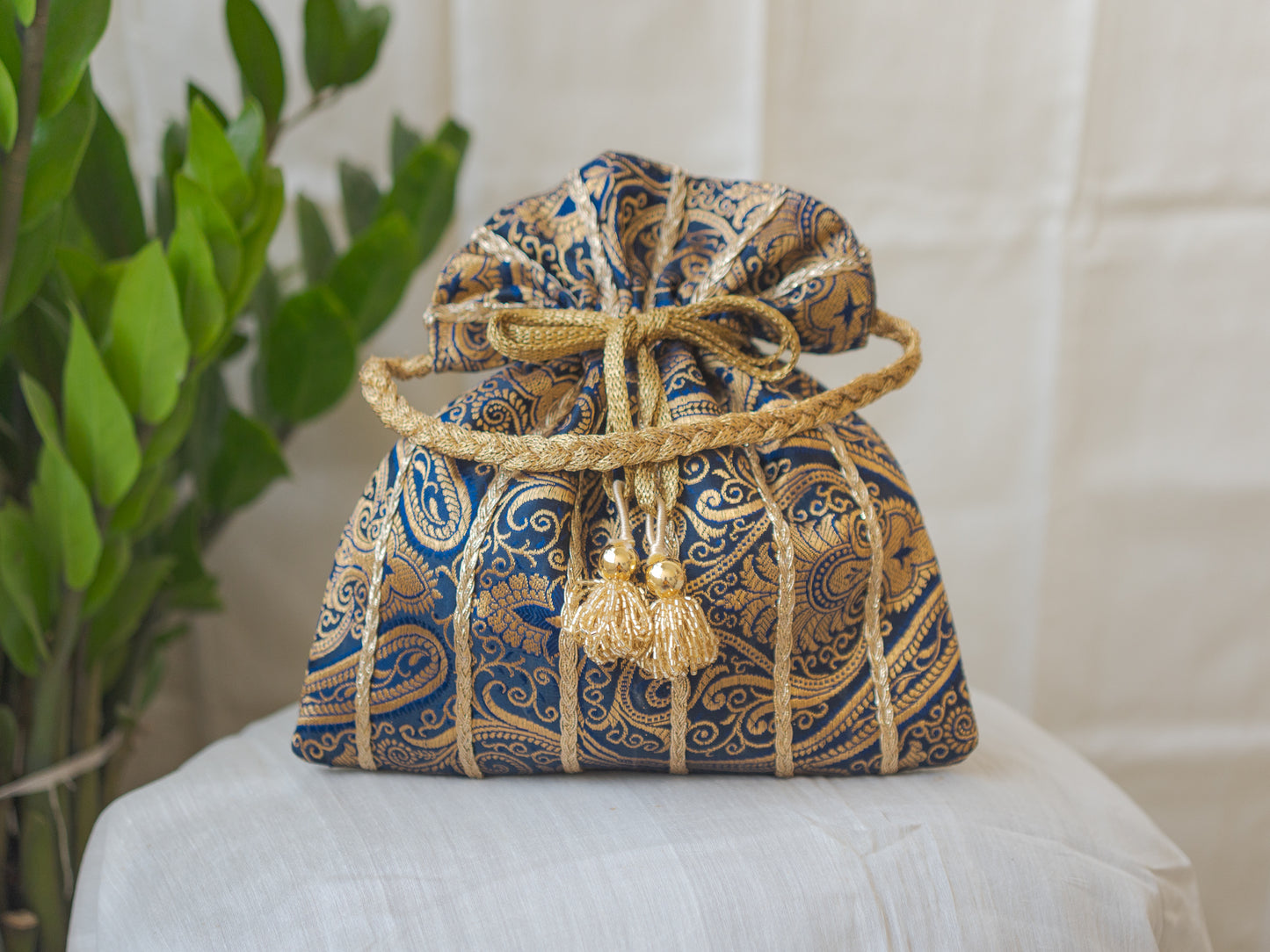 Navy Blue & Golden Banarasi Potli With Glass Tassels