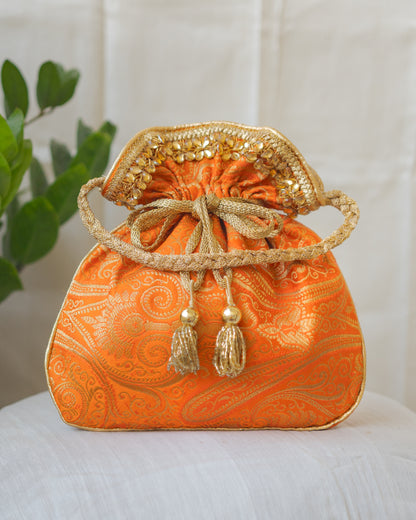 Pumpkin Orange & Golden Banarasi Potli With Glass Tassels