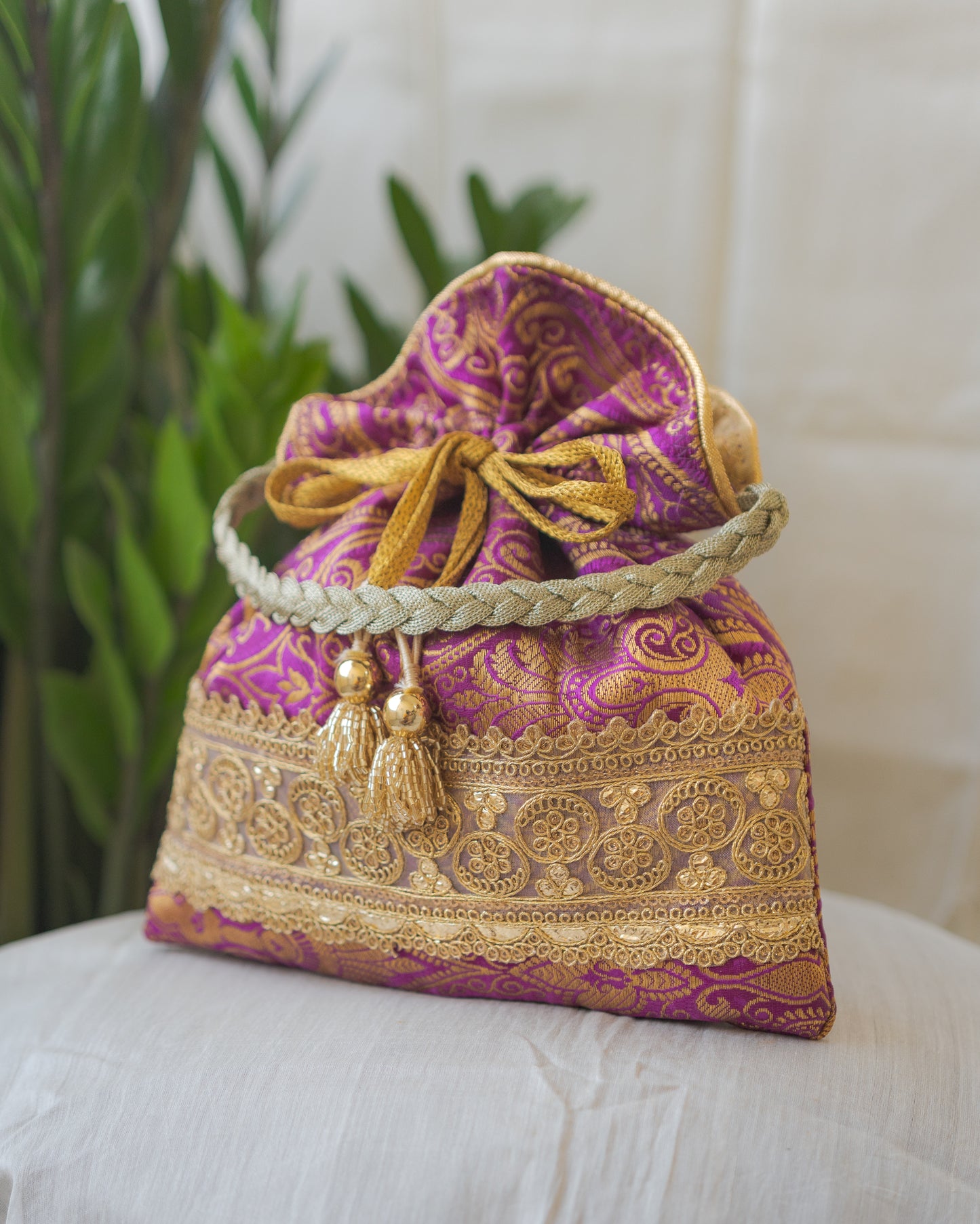 Purple & Golden Banarasi Potli With Golden Broad Lace