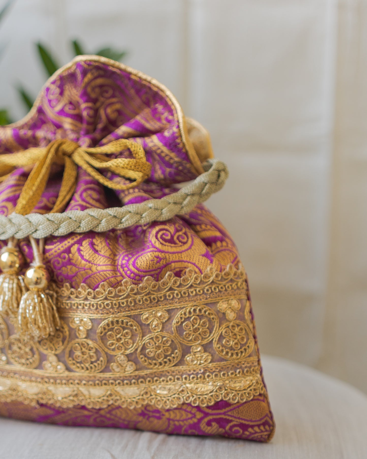 Purple & Golden Banarasi Potli With Golden Broad Lace