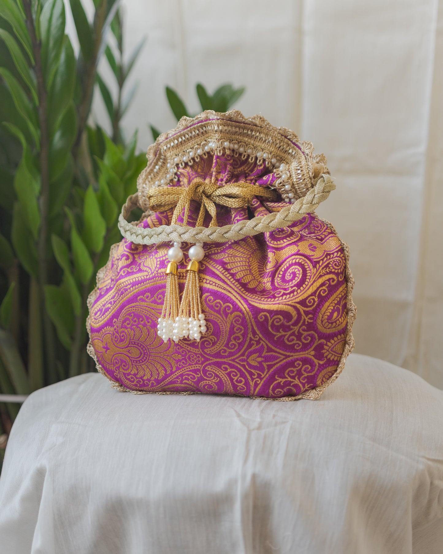 Purple & Golden Banarasi Potli With Pearl Tassels