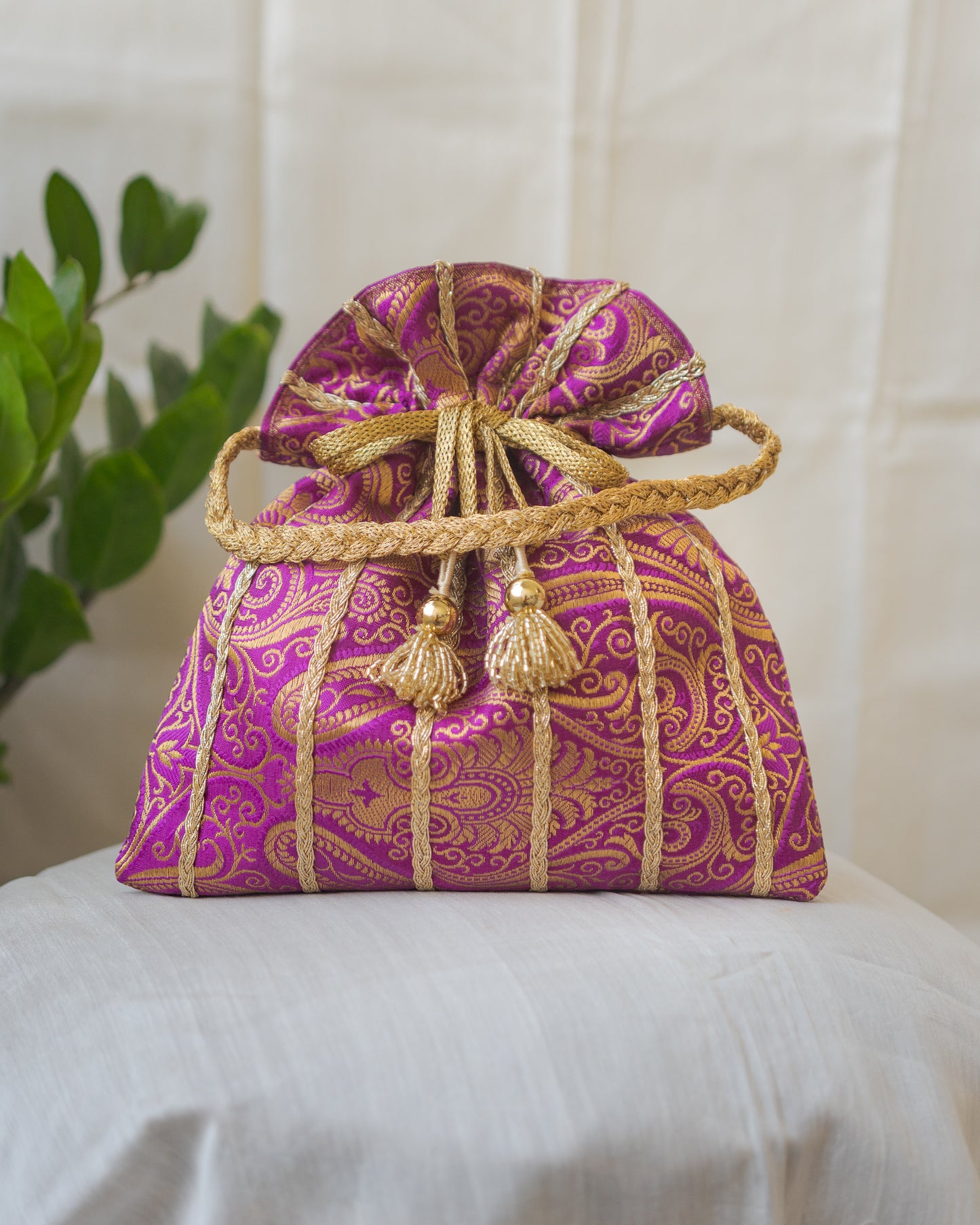 Purple & Golden Banarasi Potli With Glass Tassels