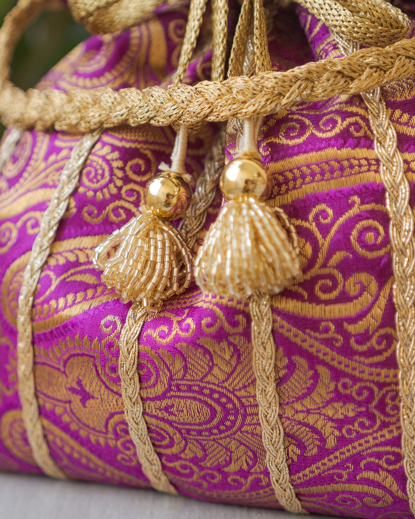 Purple & Golden Banarasi Potli With Glass Tassels