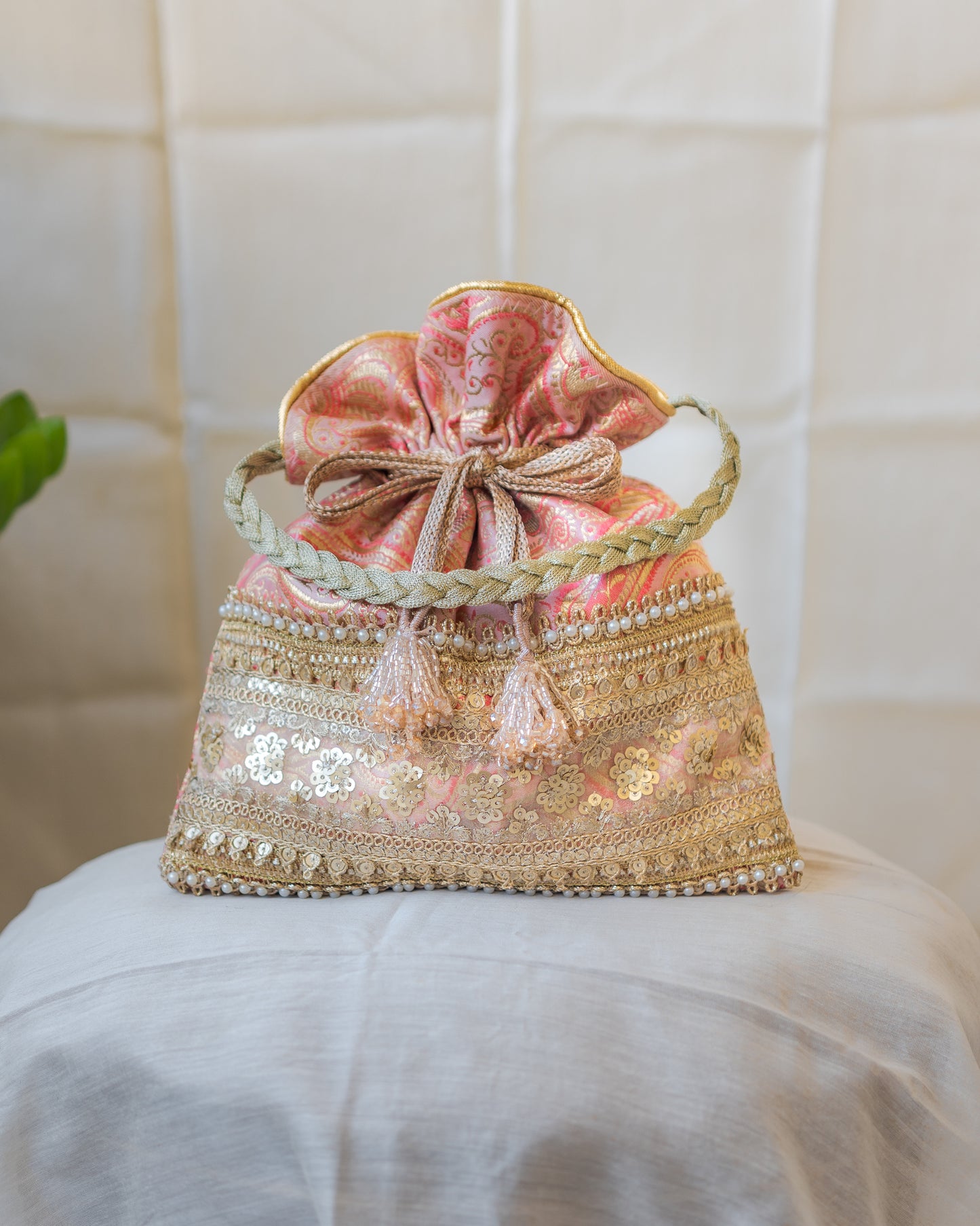 Peach Pink & Golden Banarasi Potli With Broad Sequin Pearl Lacework