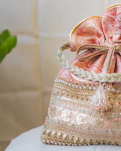 Peach Pink & Golden Banarasi Potli With Broad Sequin Pearl Lacework