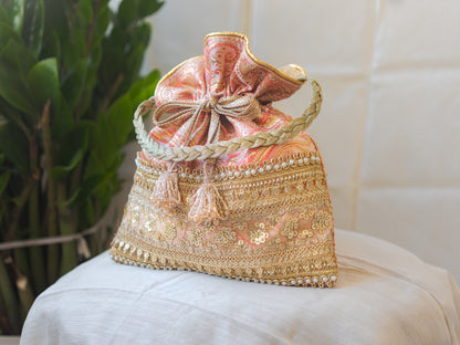 Peach Pink & Golden Banarasi Potli With Broad Sequin Pearl Lacework